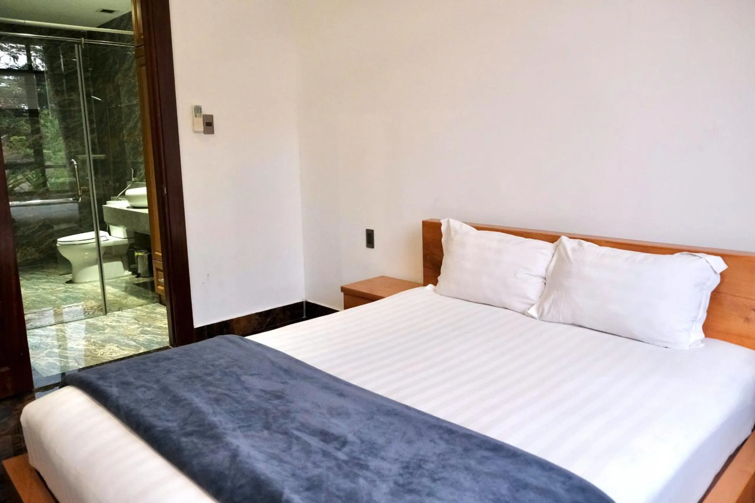 Bed in Kim Minh Apartment & Hotel