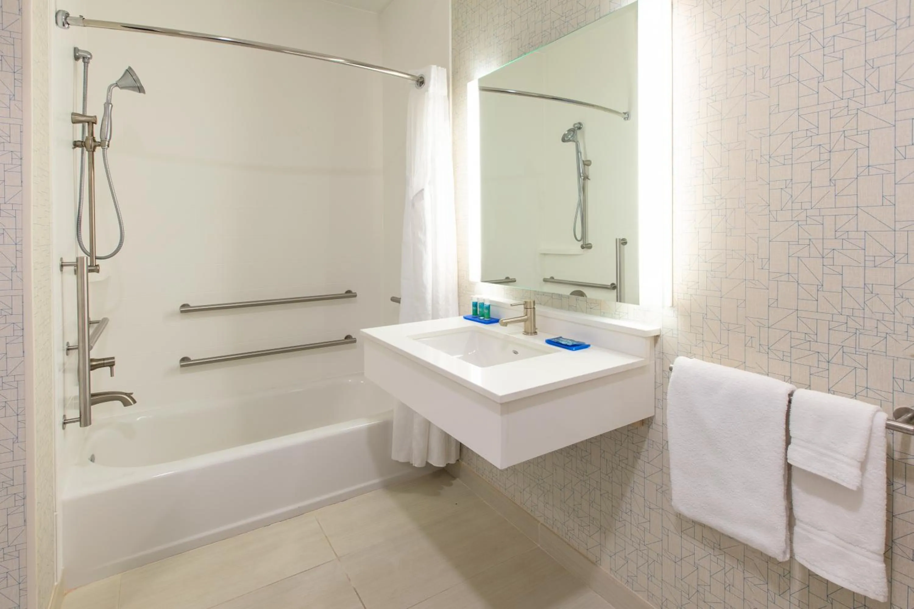 Shower in Holiday Inn Express Hotel & Suites Seaside Convention Center by IHG