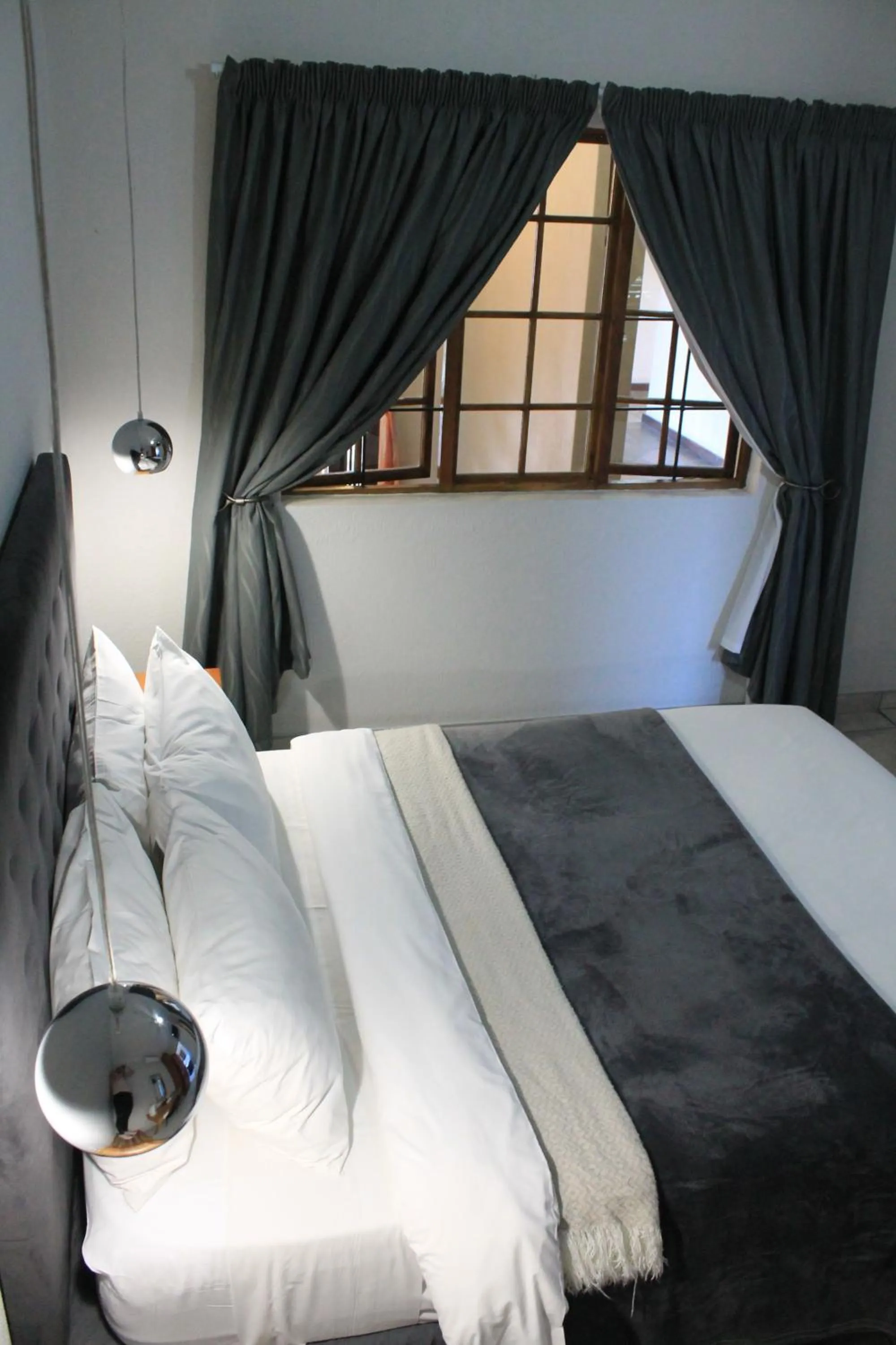 Photo of the whole room, Bed in Nelspruit Lodge