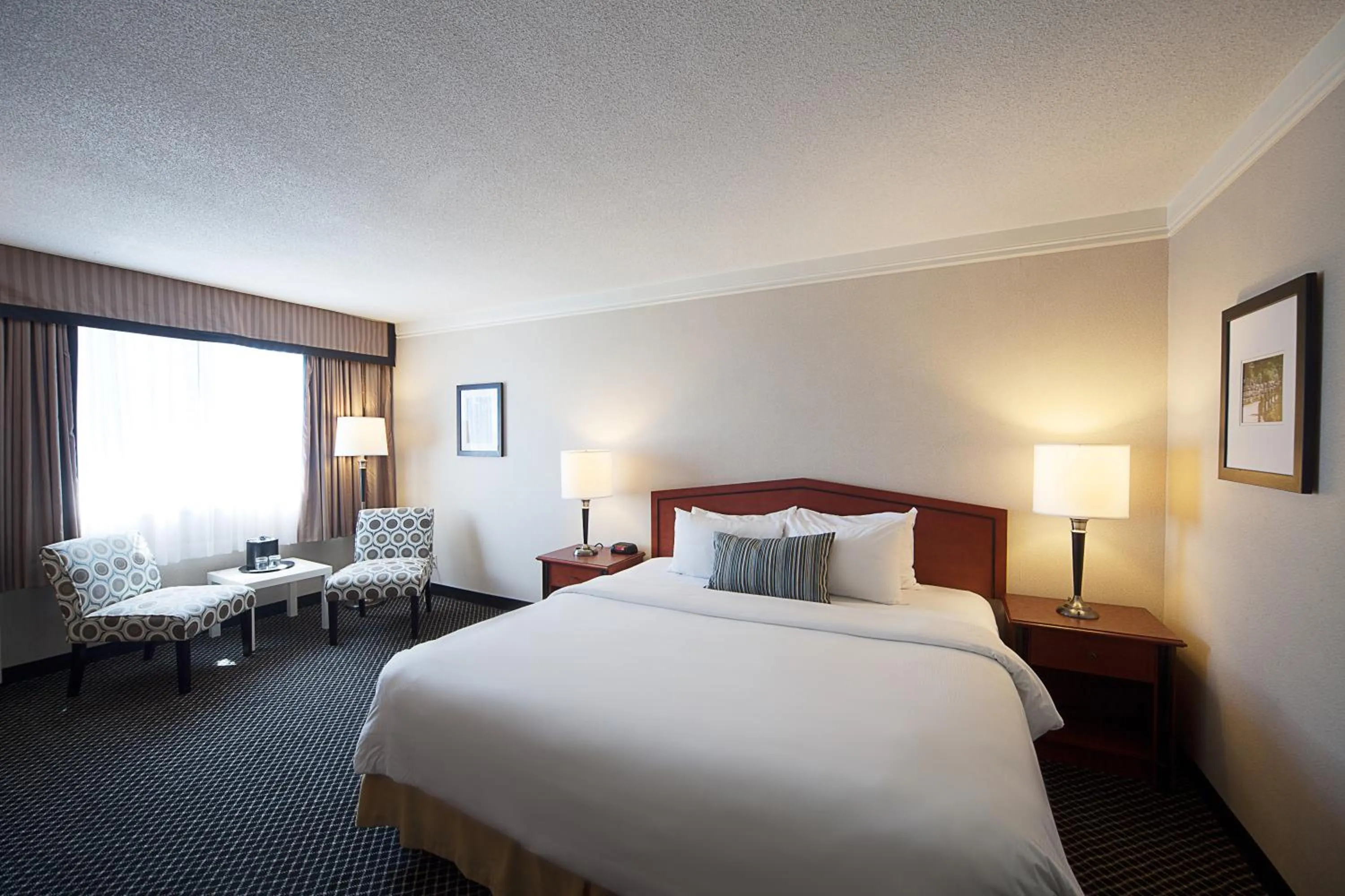 Bedroom, Bed in Toronto Don Valley Hotel and Suites