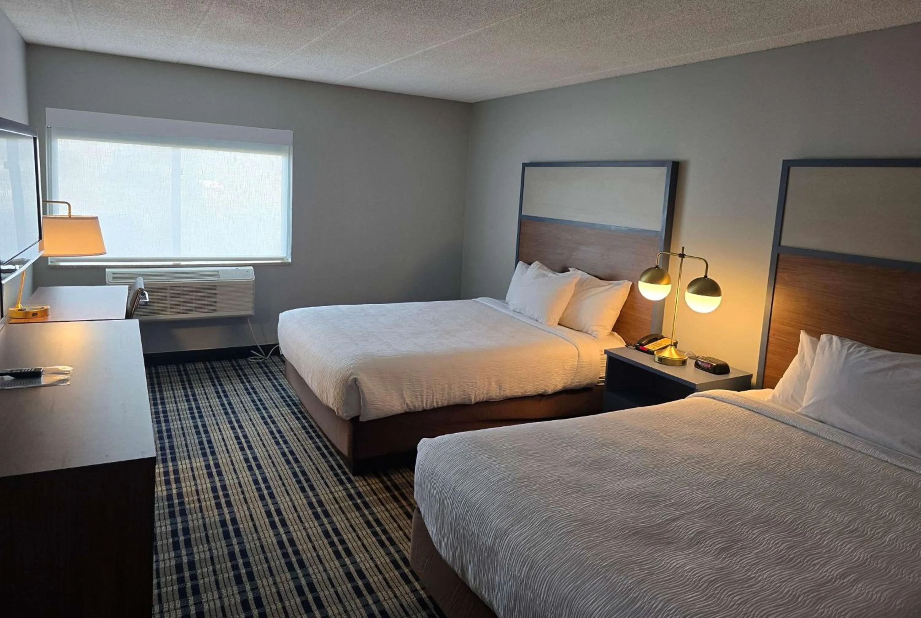 Photo of the whole room, Bed in AmericInn by Wyndham Beloit