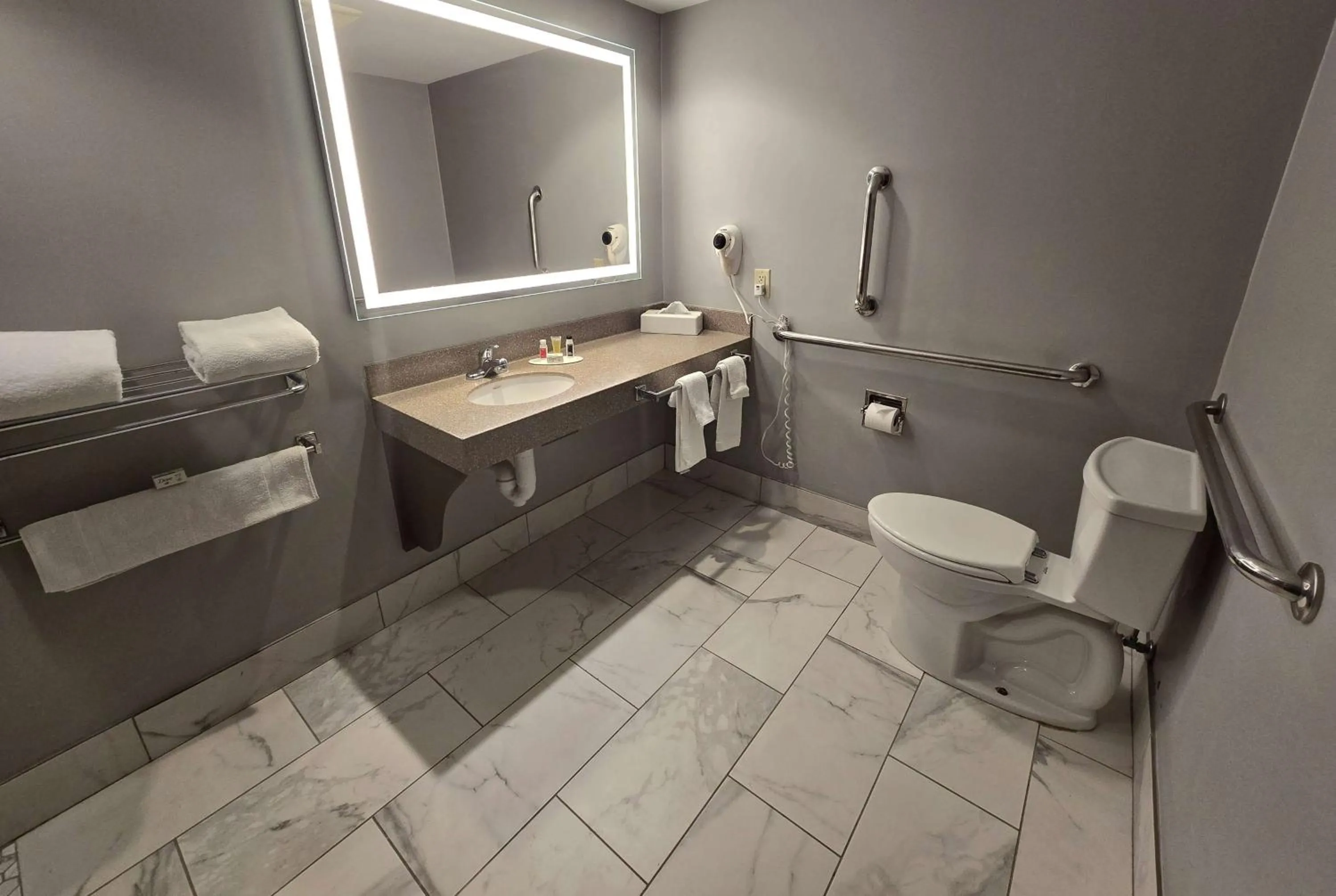 Shower in AmericInn by Wyndham Beloit