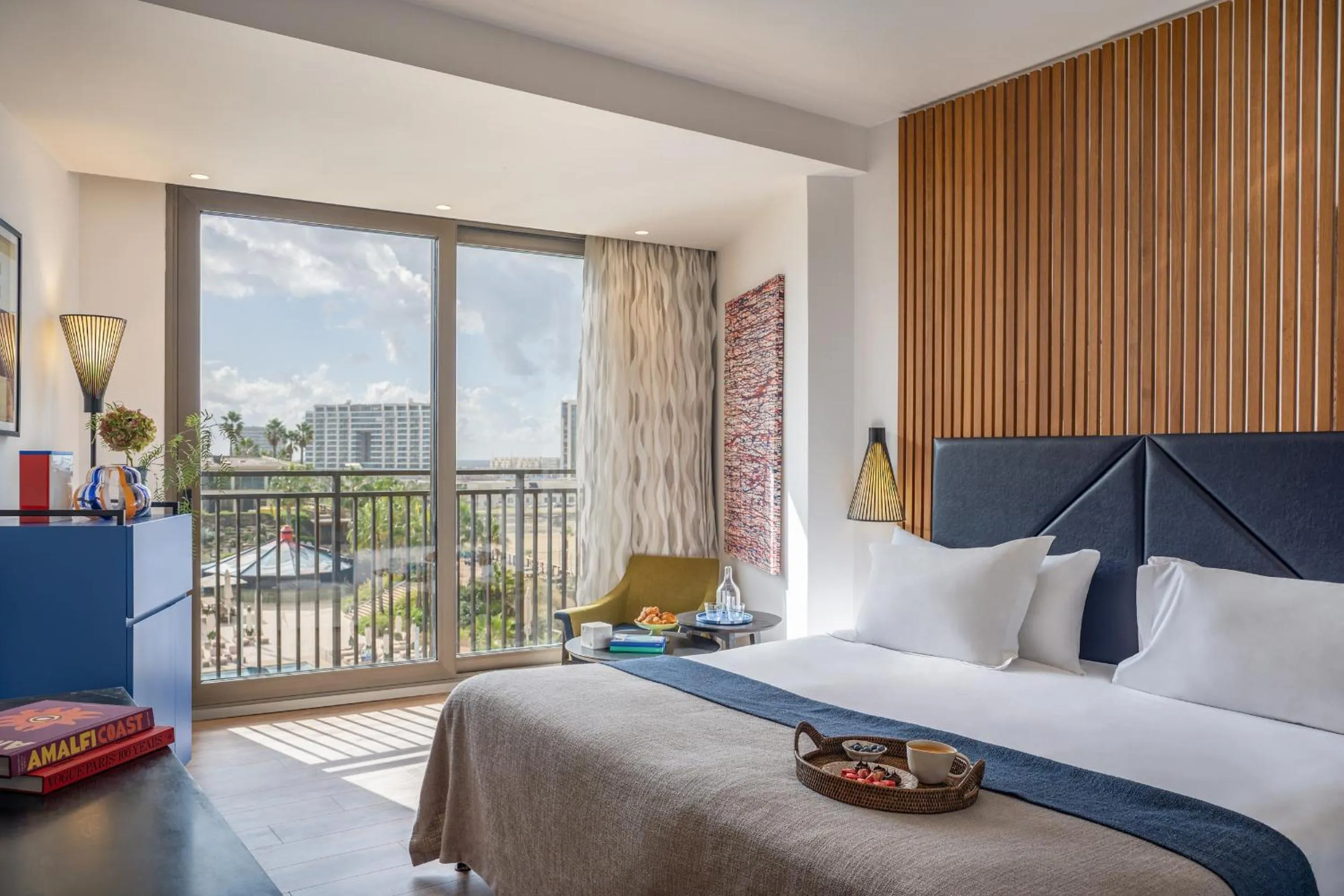 Bed in Dan Accadia Herzliya Hotel