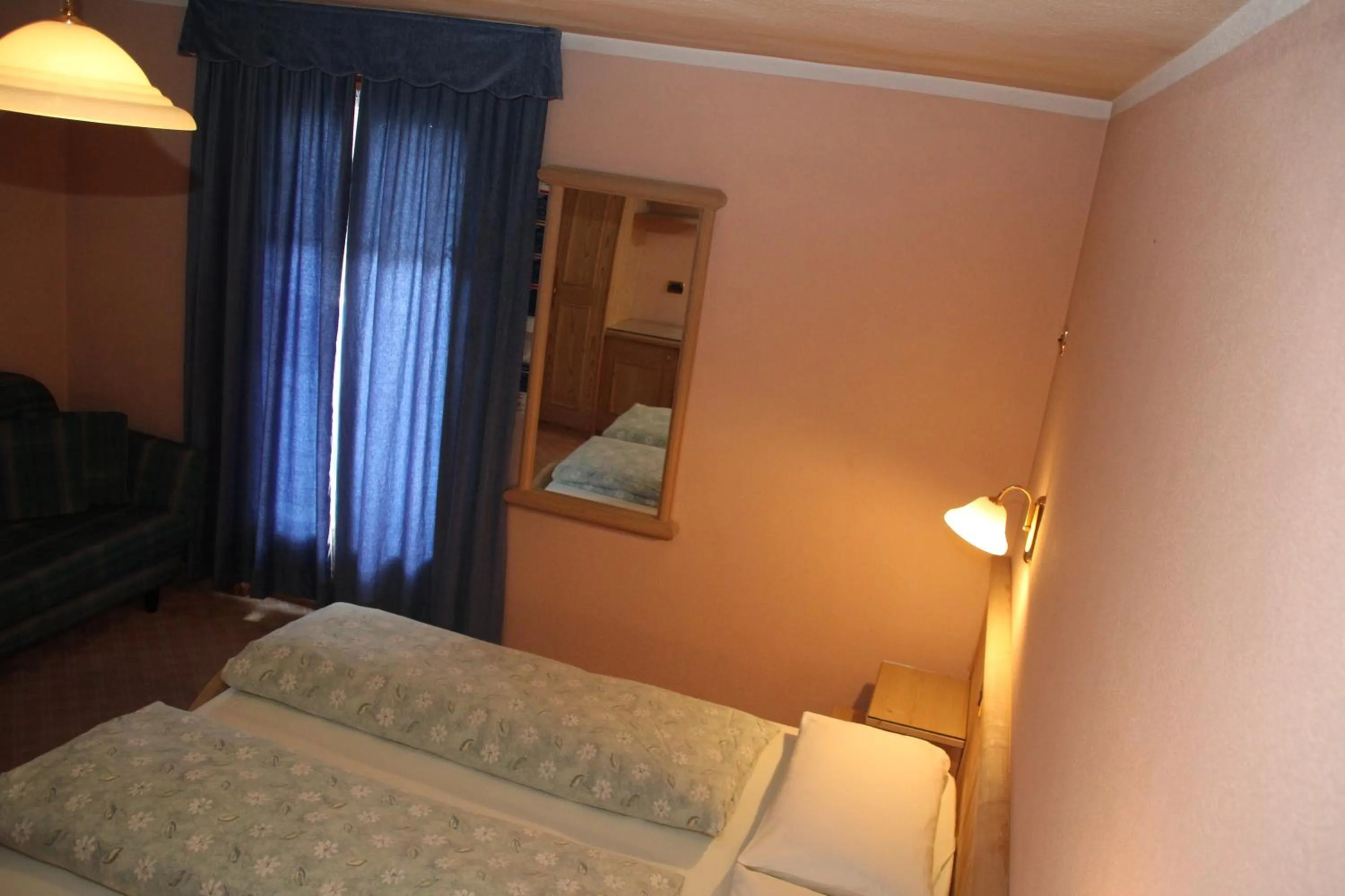 Photo of the whole room, Bed in Albergo Caravasc