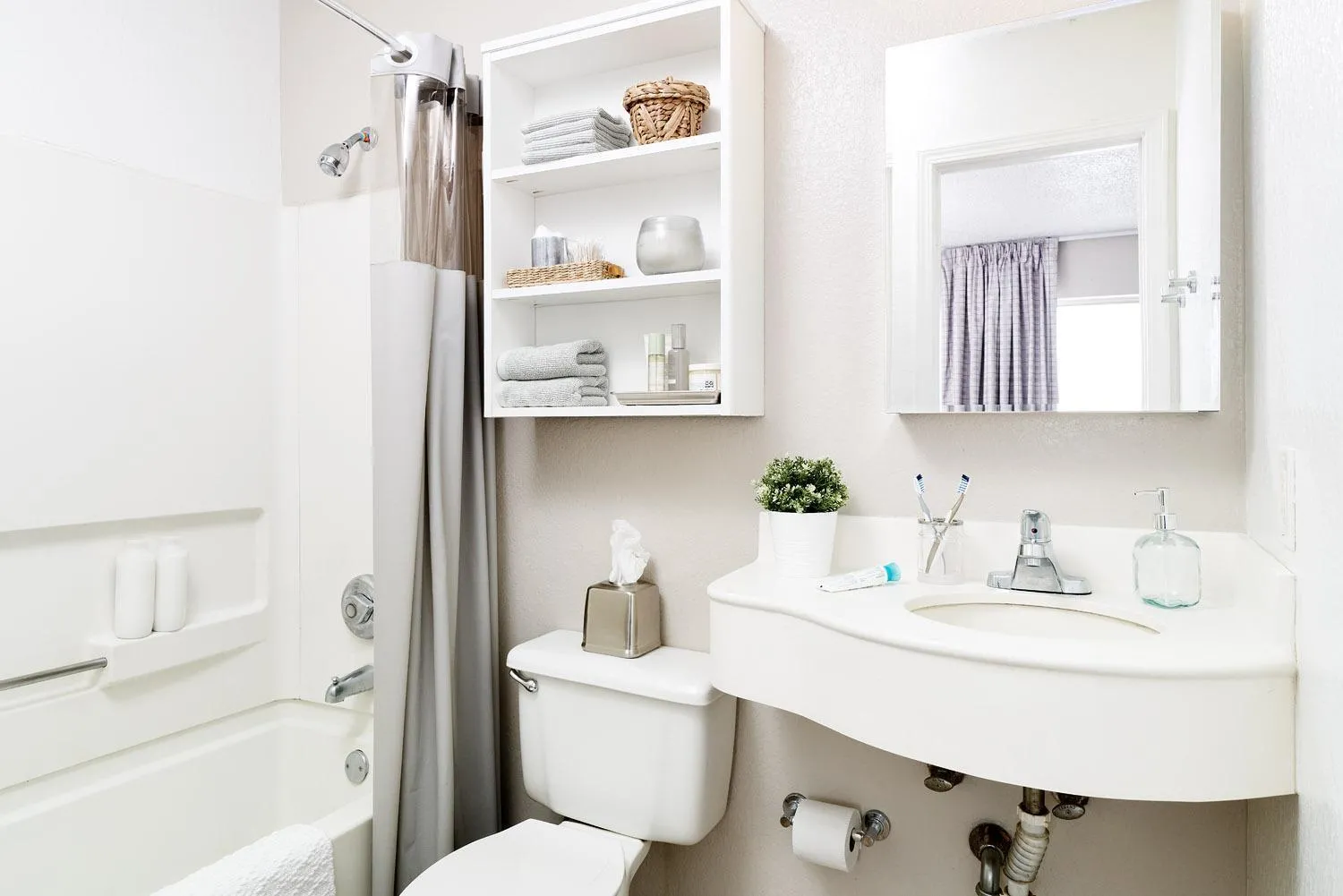 Bathroom in InTown Suites Extended Stay Houston TX - Stuebner Airline Rd