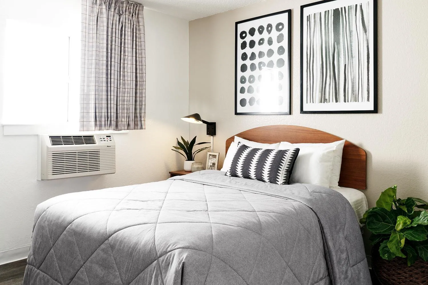 Bedroom, Bed in InTown Suites Extended Stay Houston TX - Stuebner Airline Rd
