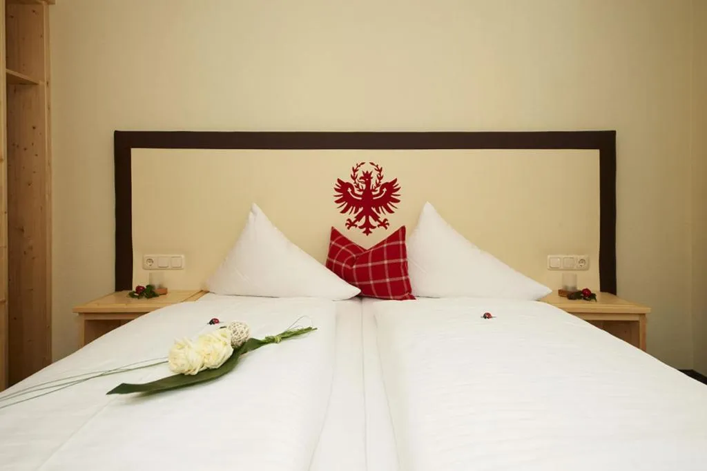 Decorative detail, Bed in Hotel Garni Rauch