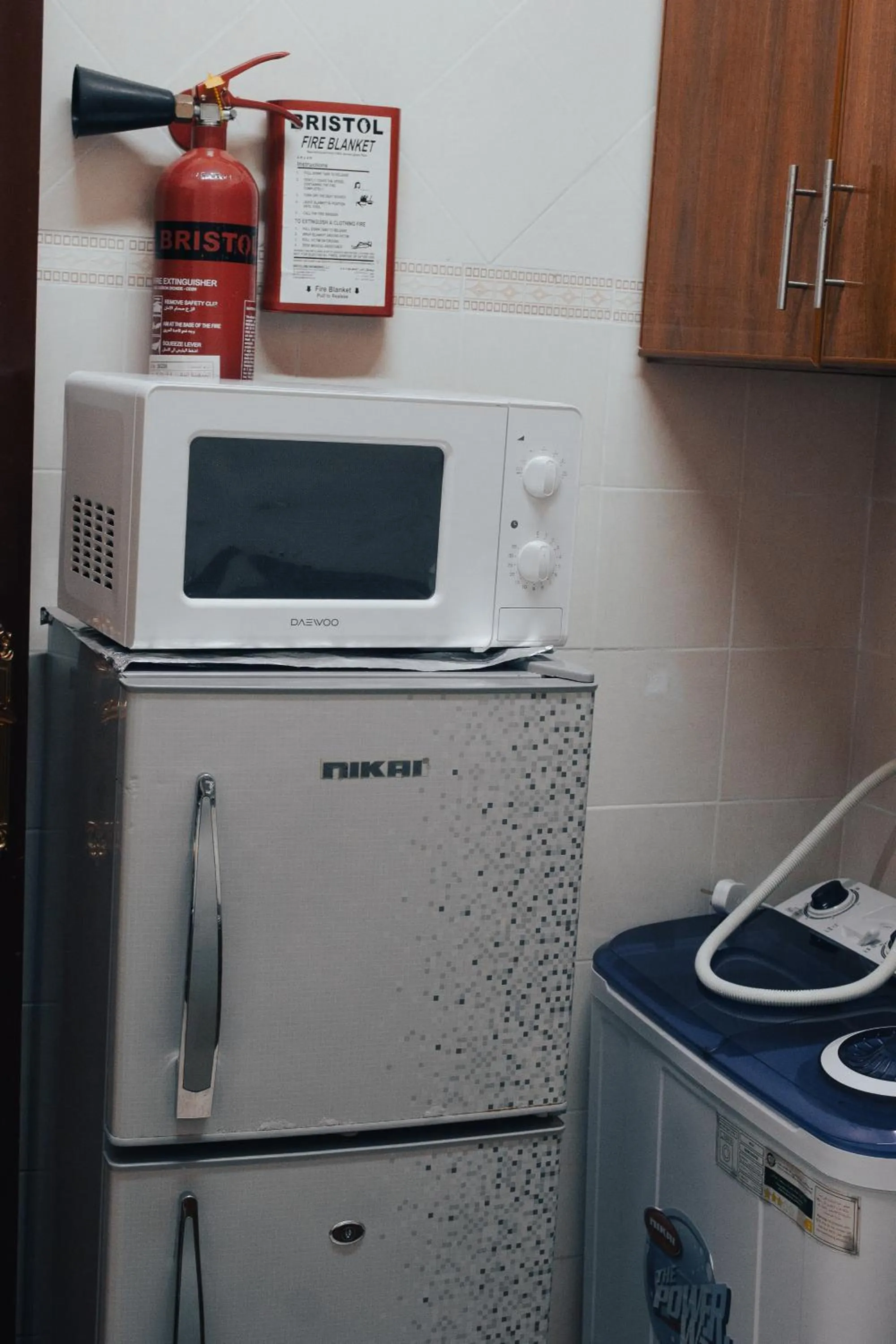 Kitchen or kitchenette in Jawharet Al Kheir Furnished Apartments