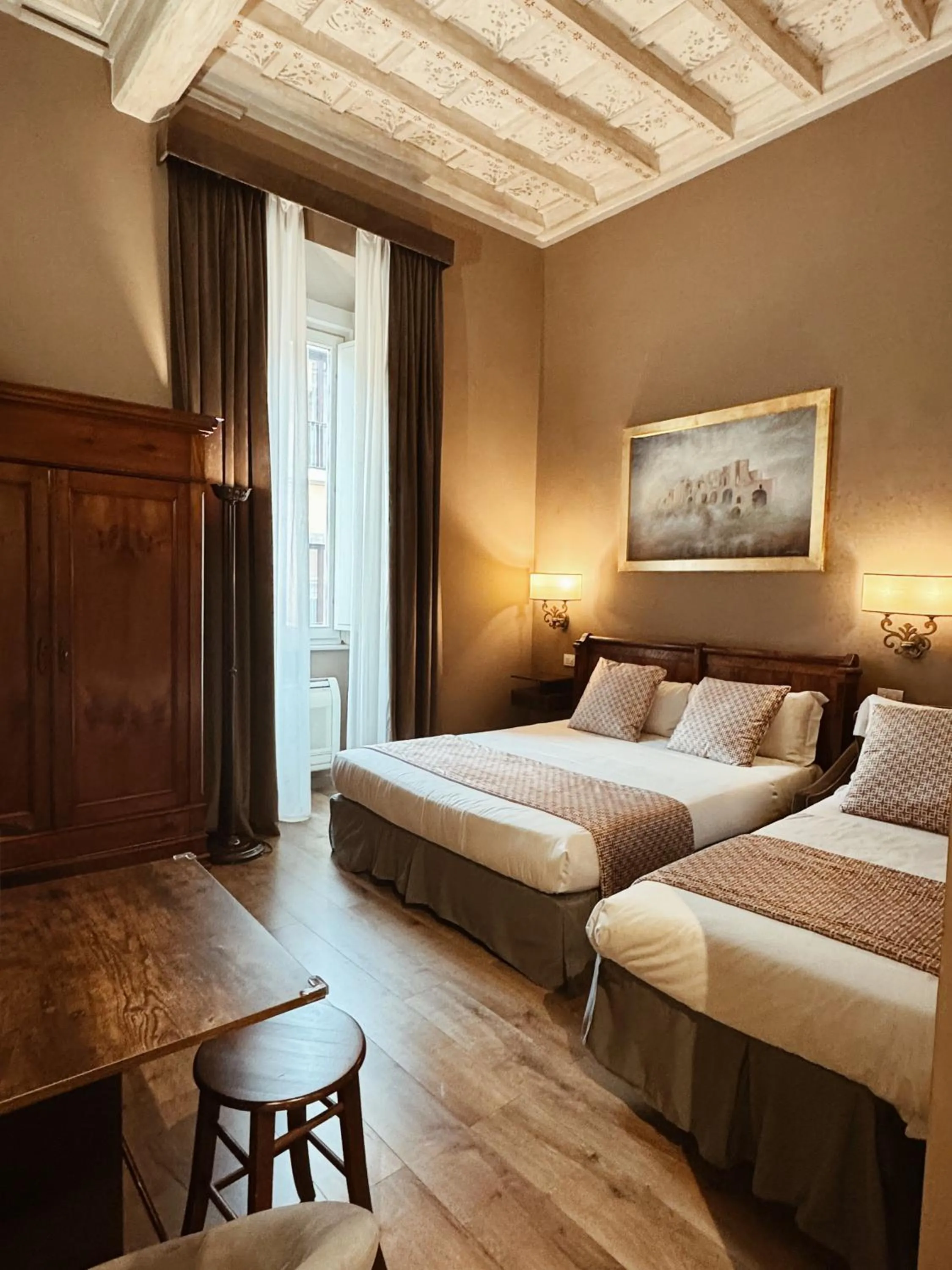 Bed in Residenza Sciarra Suites