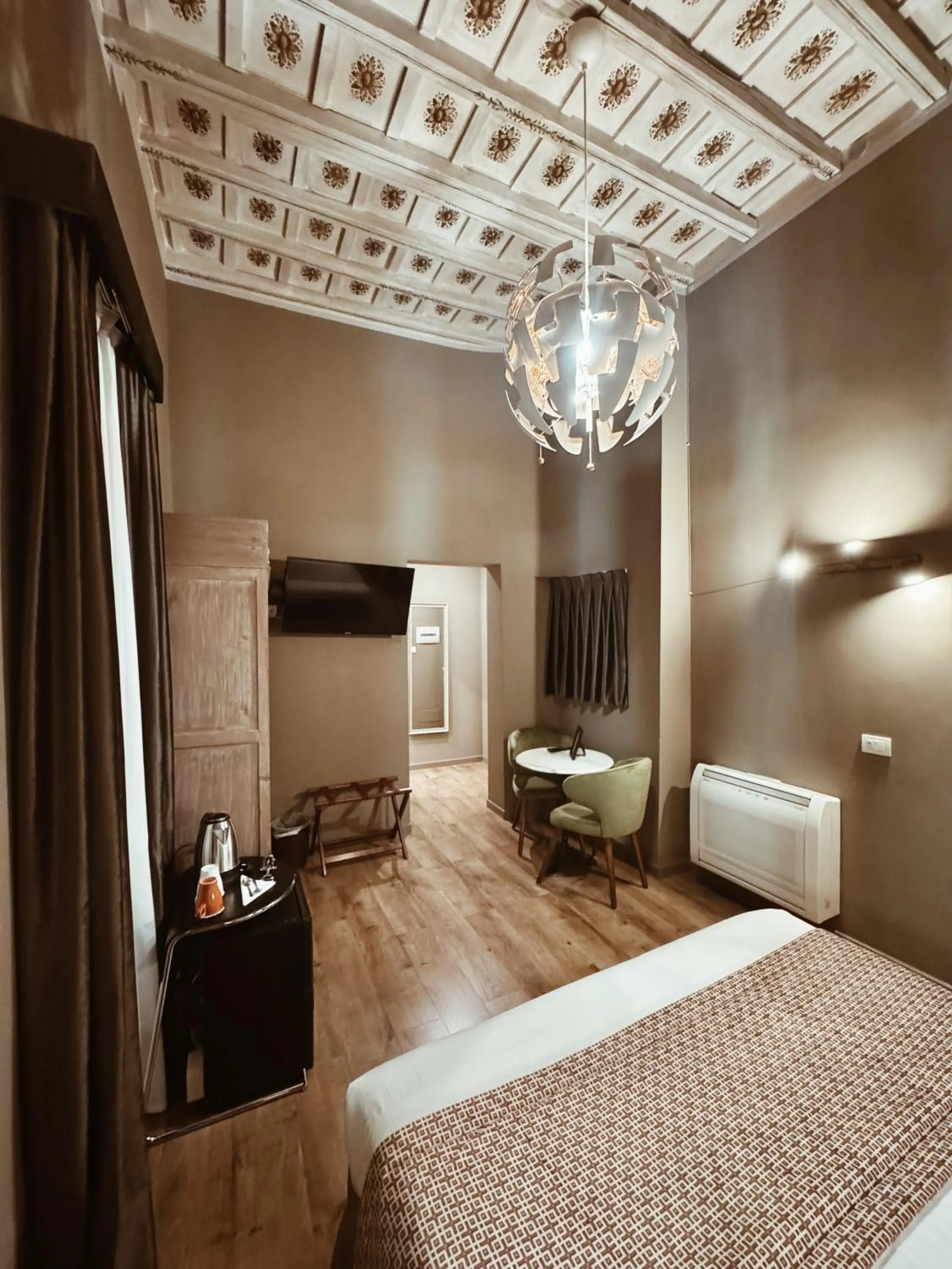 Bed in Residenza Sciarra Suites