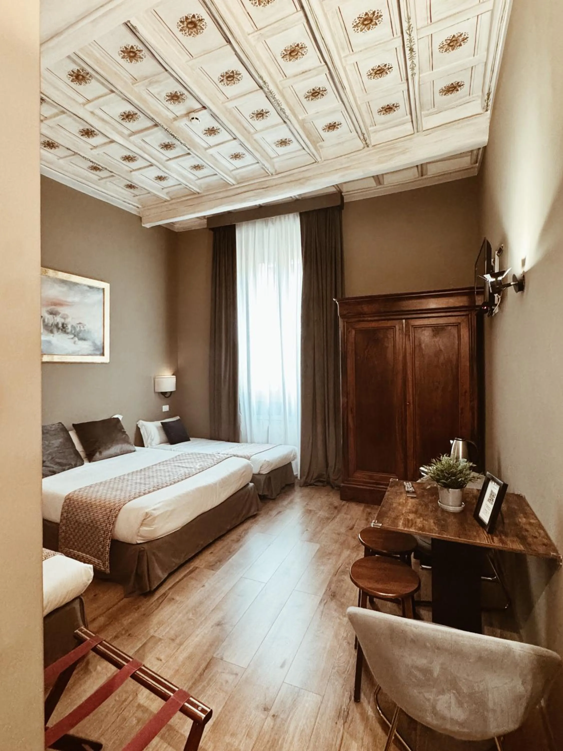 Bed in Residenza Sciarra Suites