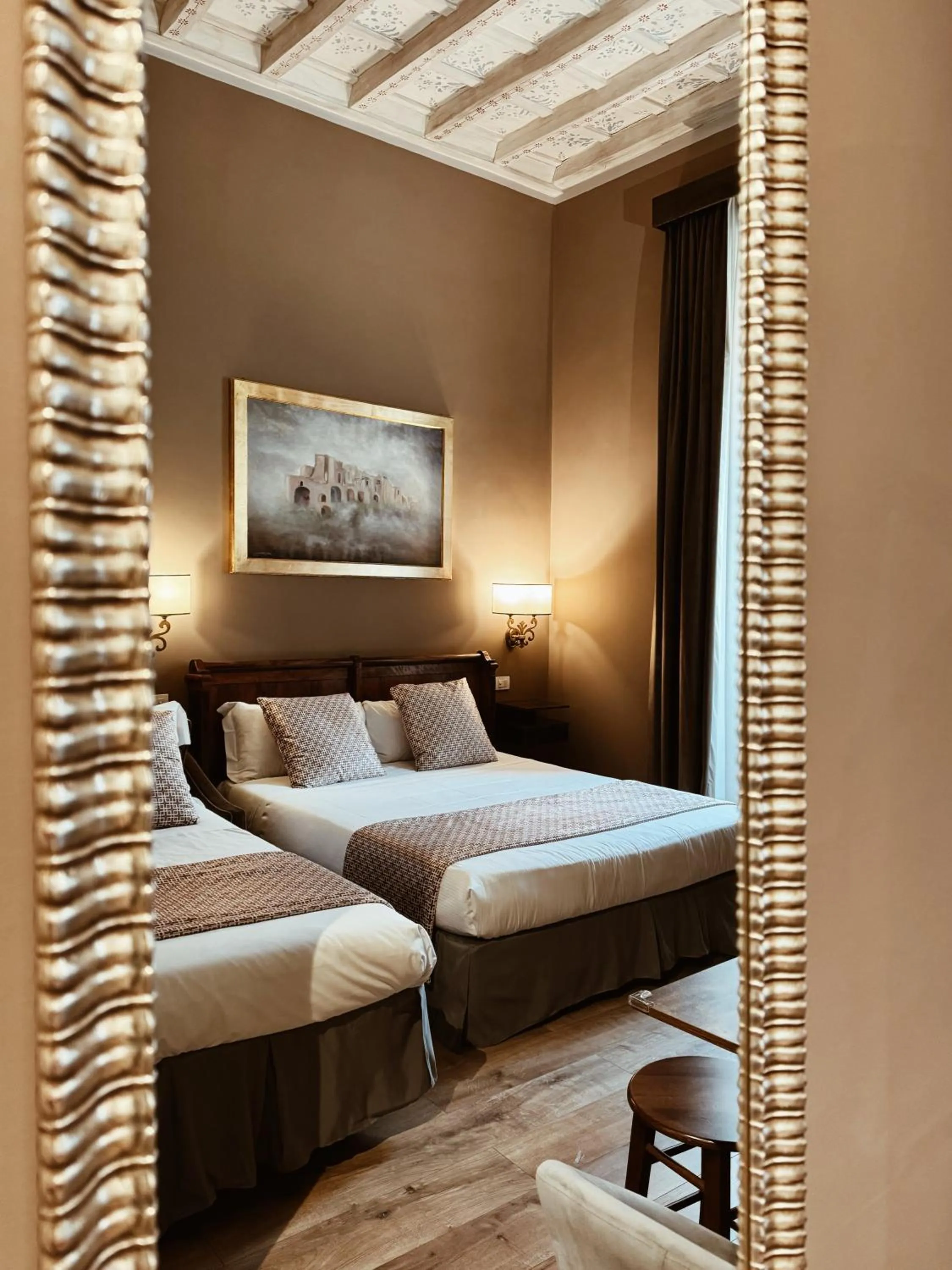 Bed in Residenza Sciarra Suites