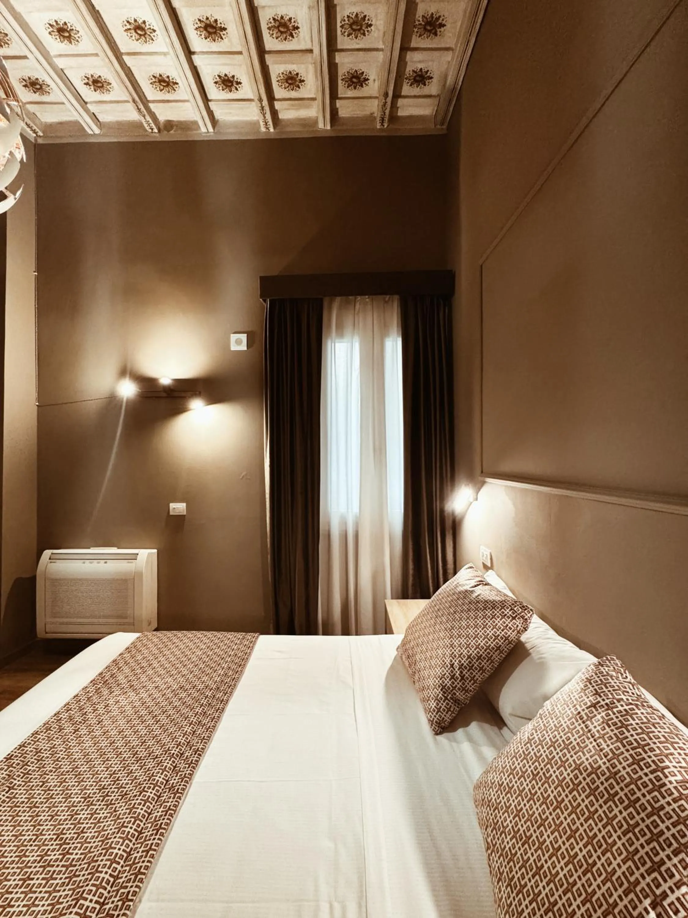 Bed in Residenza Sciarra Suites