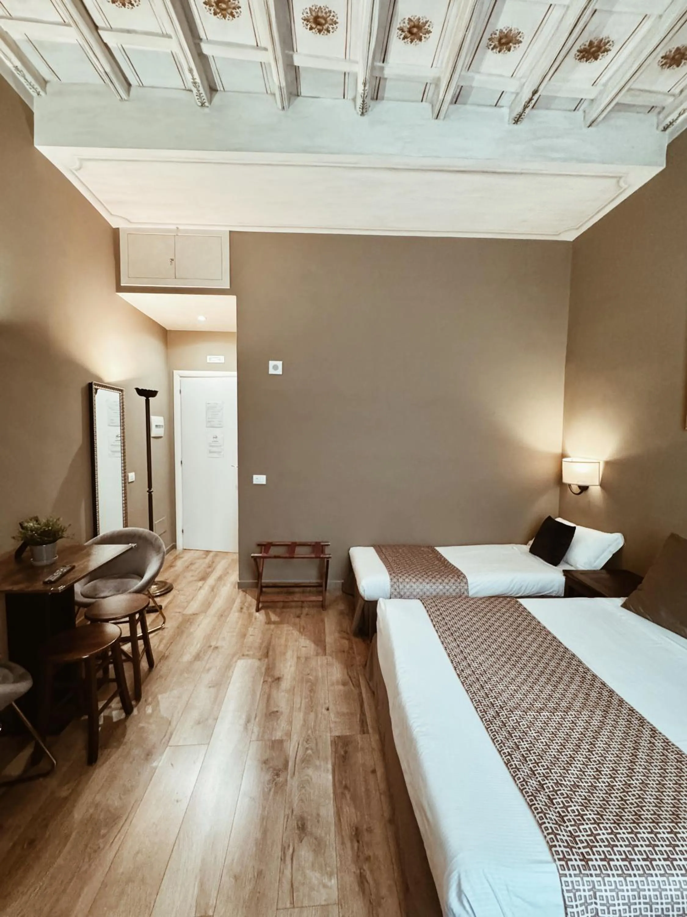 Bed in Residenza Sciarra Suites