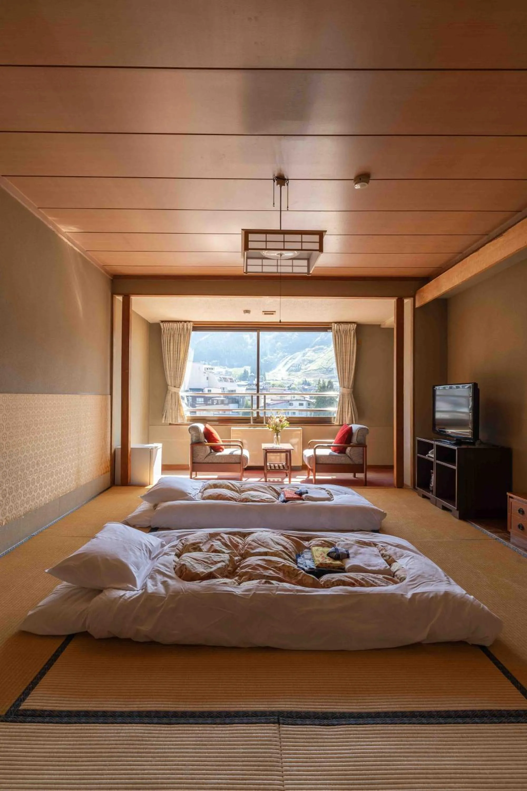 Bed in Nozawa View Hotel Shimataya