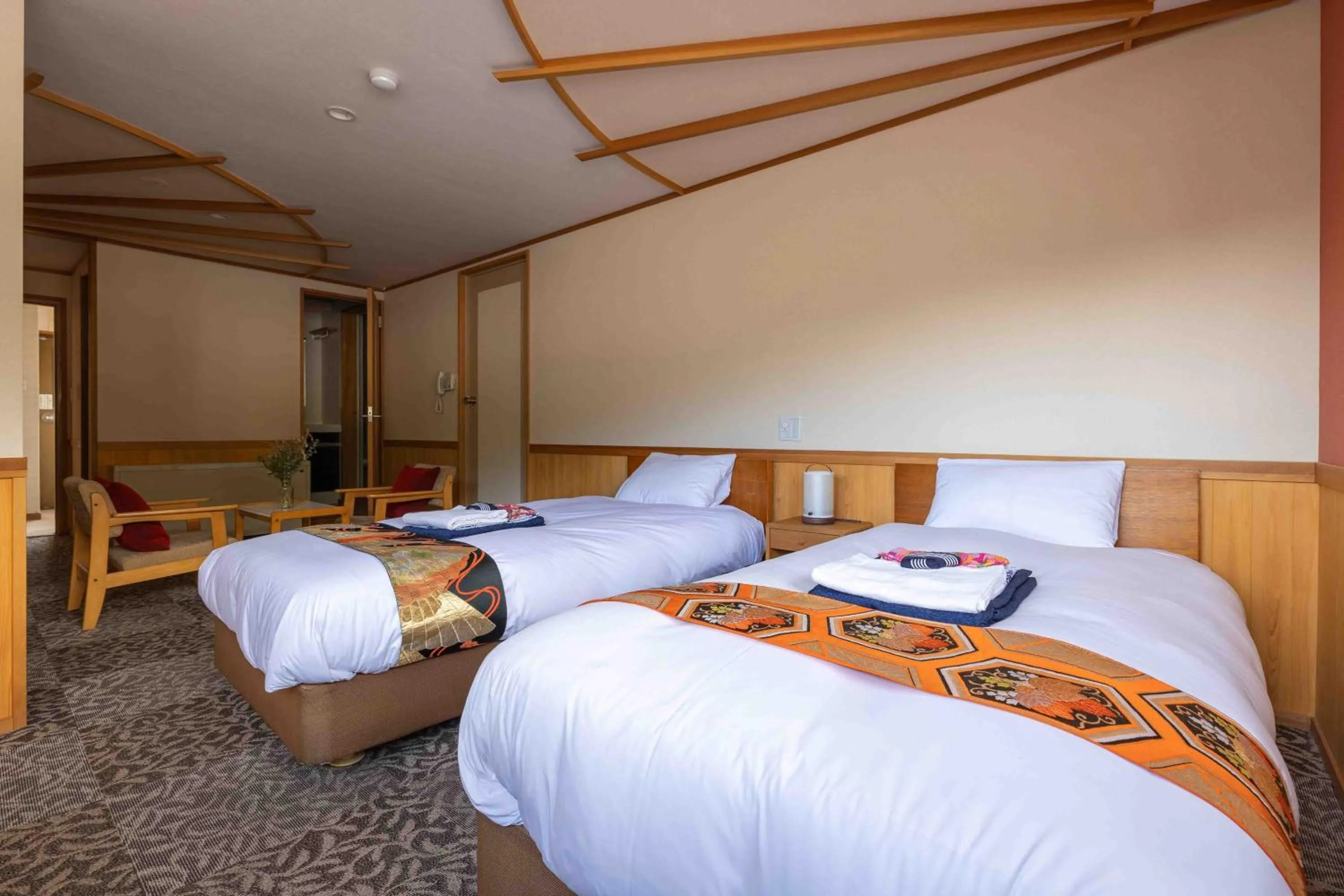 Bed in Nozawa View Hotel Shimataya