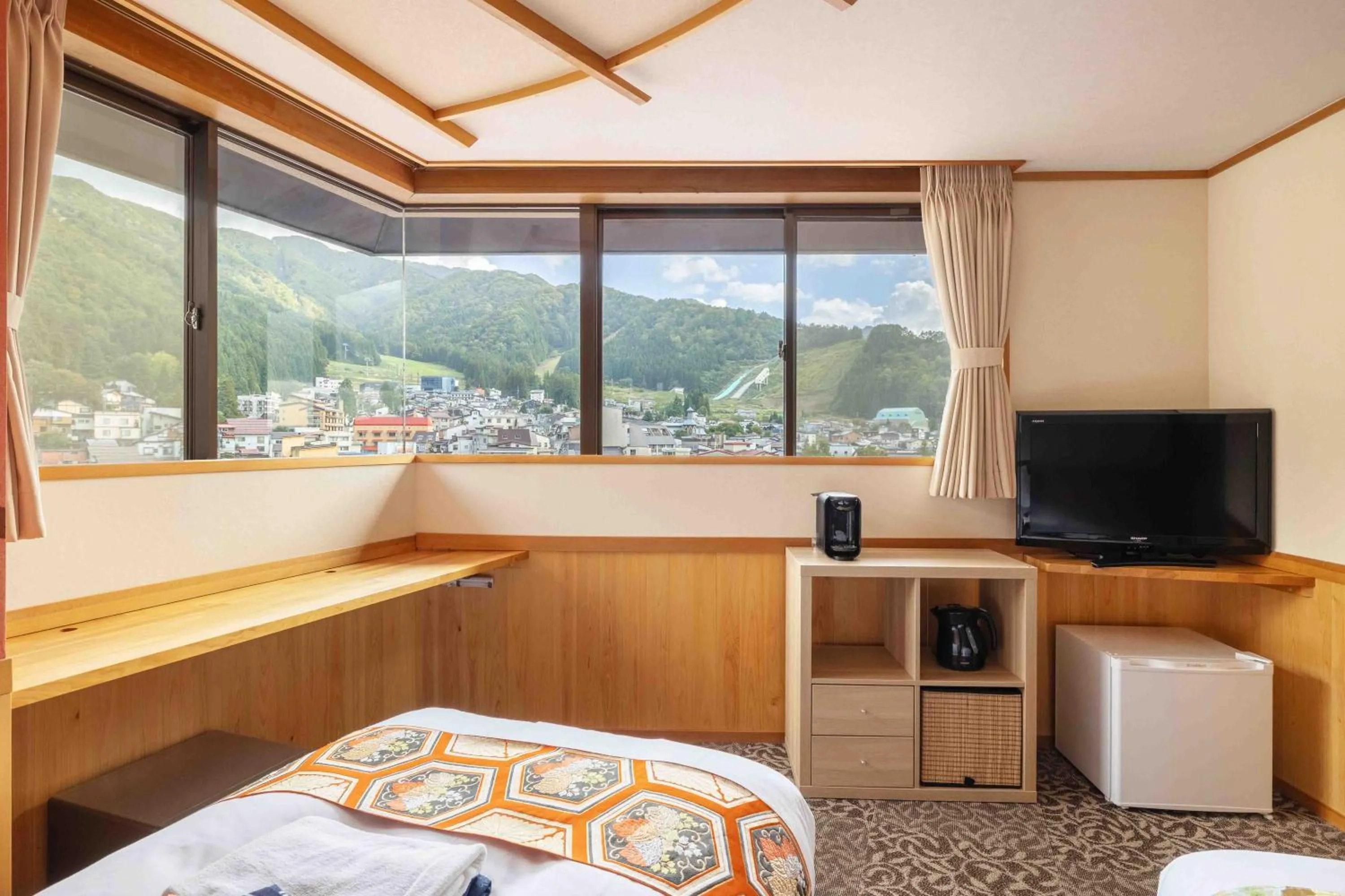 Bed in Nozawa View Hotel Shimataya