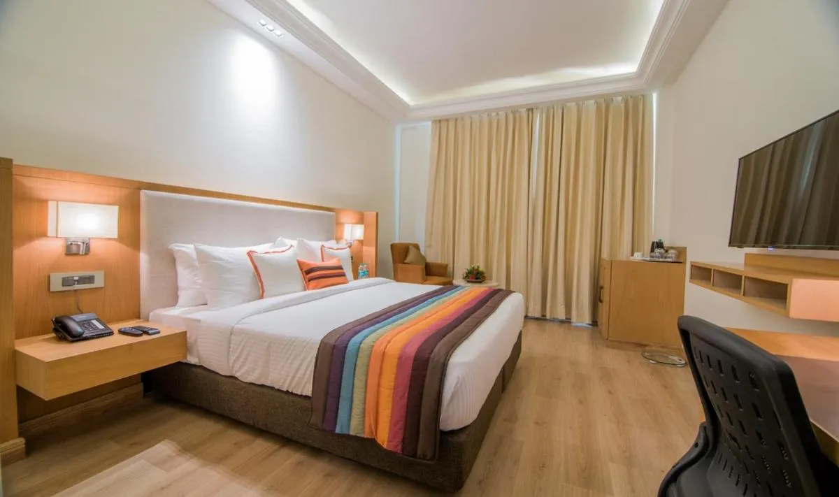 Photo of the whole room, Bed in The Imperial Poonam Hotel