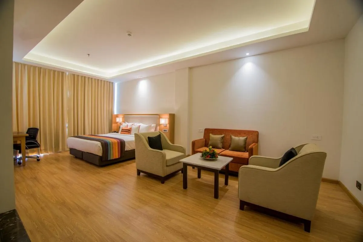 Photo of the whole room, Bed in The Imperial Poonam Hotel