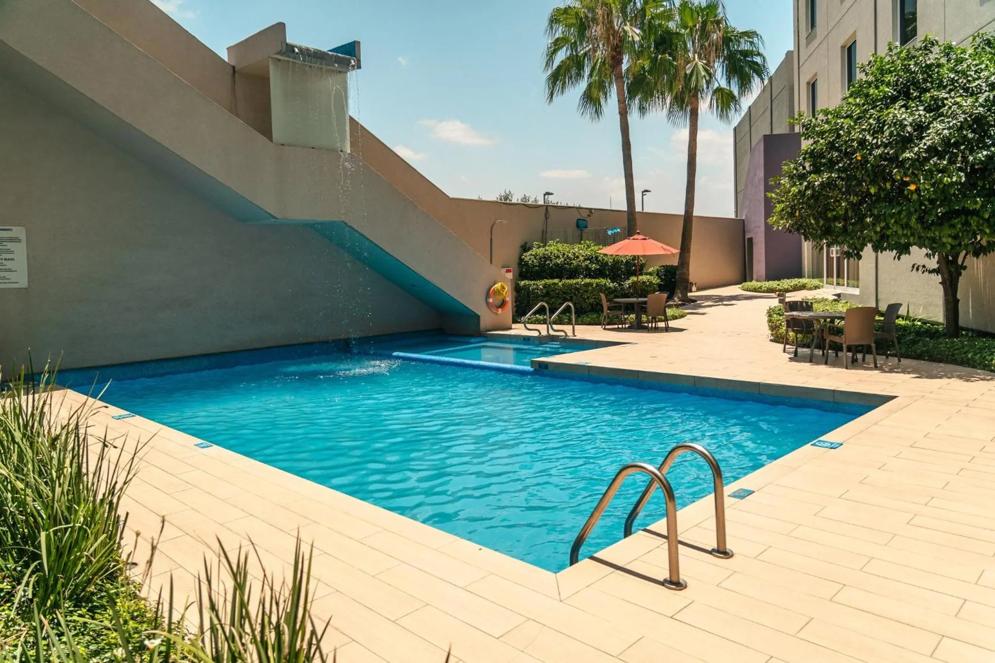 Swimming pool in Crowne Plaza Monterrey Aeropuerto by IHG