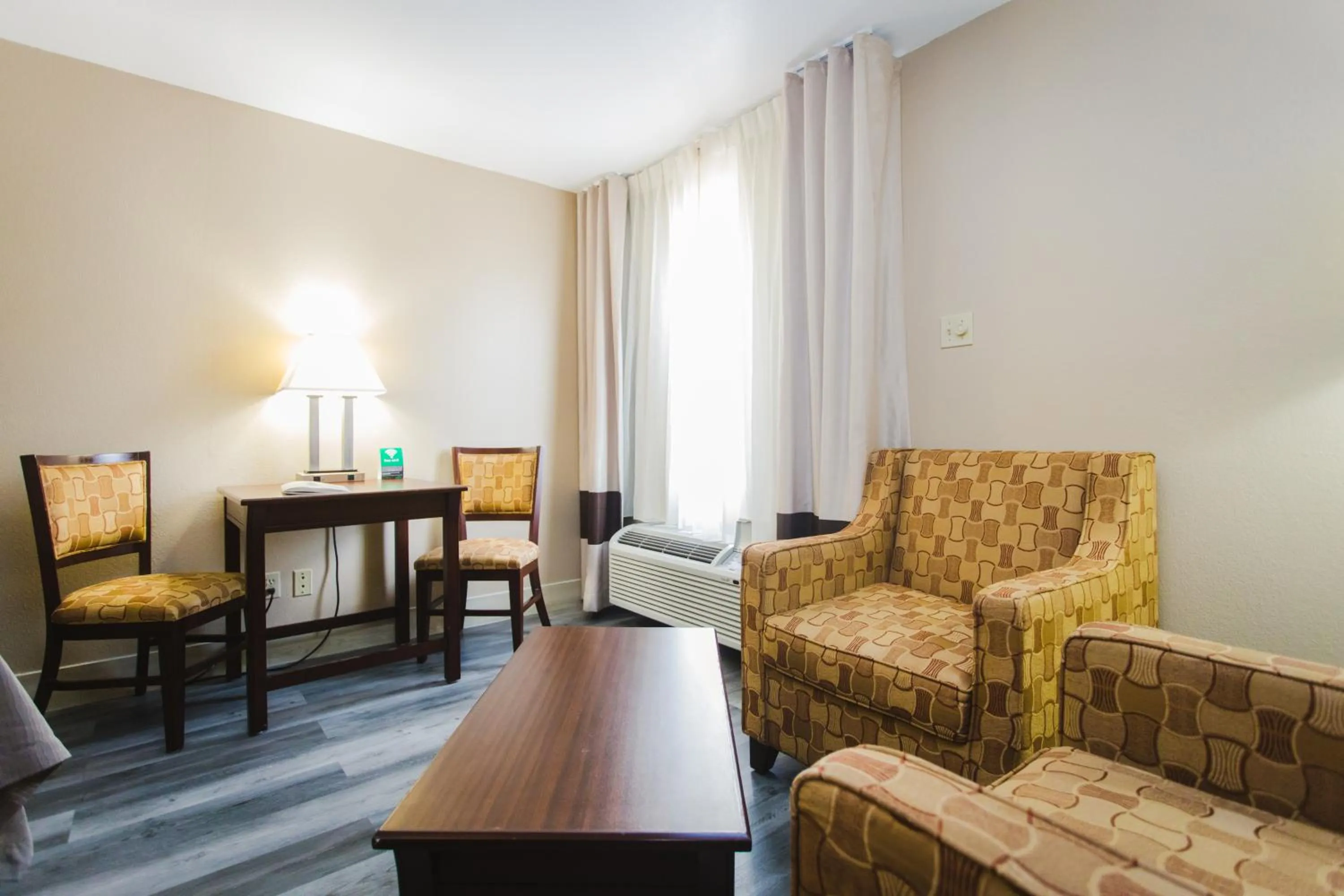 Seating area in Days Inn by Wyndham Rosenberg