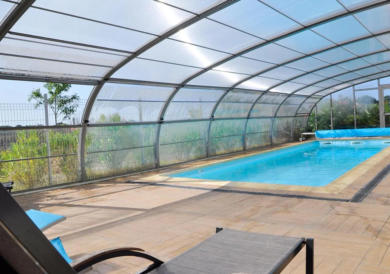 Swimming pool in Golden Tulip Pornic Suites- Appart Hotel