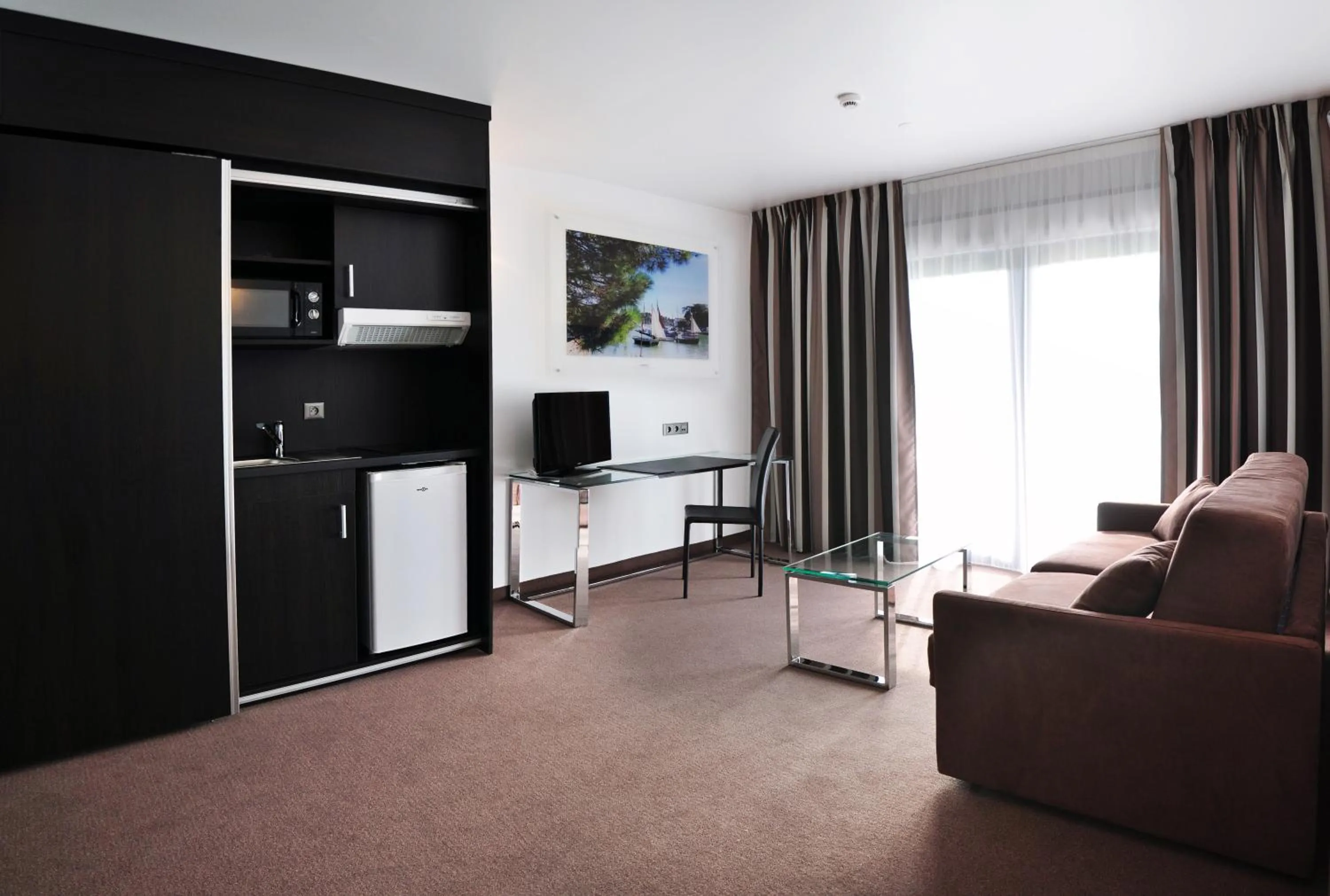 Bedroom in Golden Tulip Pornic Suites- Appart Hotel