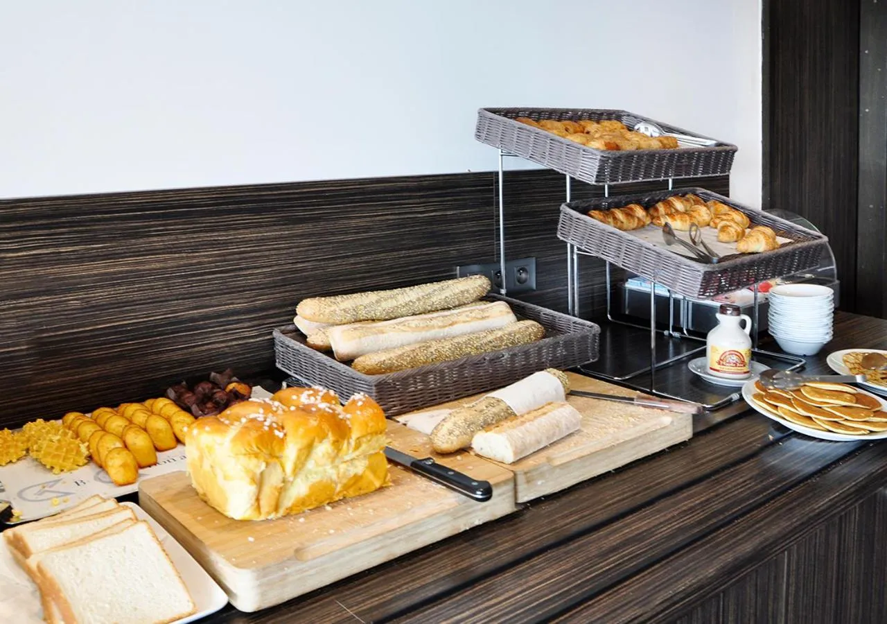 Buffet breakfast in Golden Tulip Pornic Suites- Appart Hotel