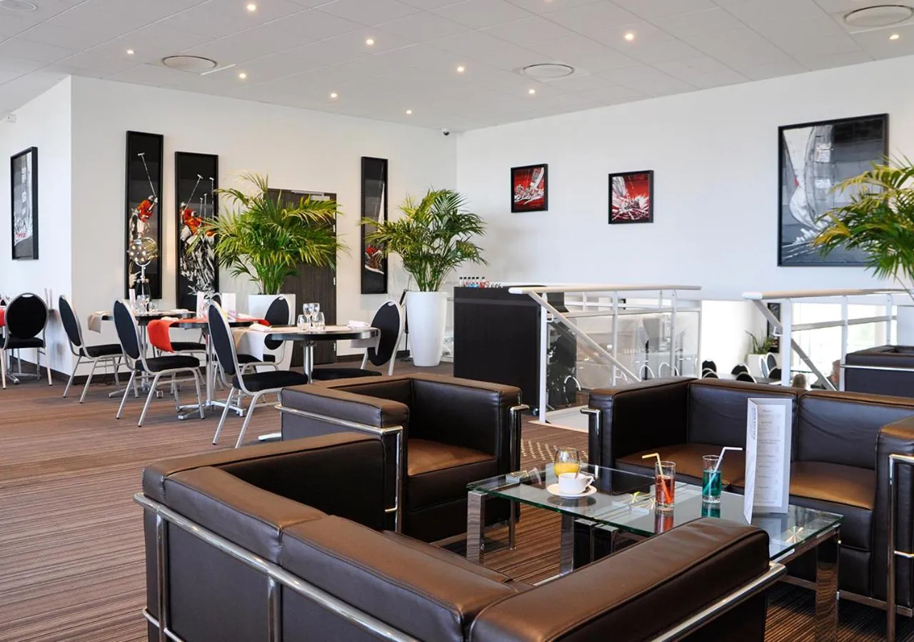 Lounge or bar in Golden Tulip Pornic Suites- Appart Hotel