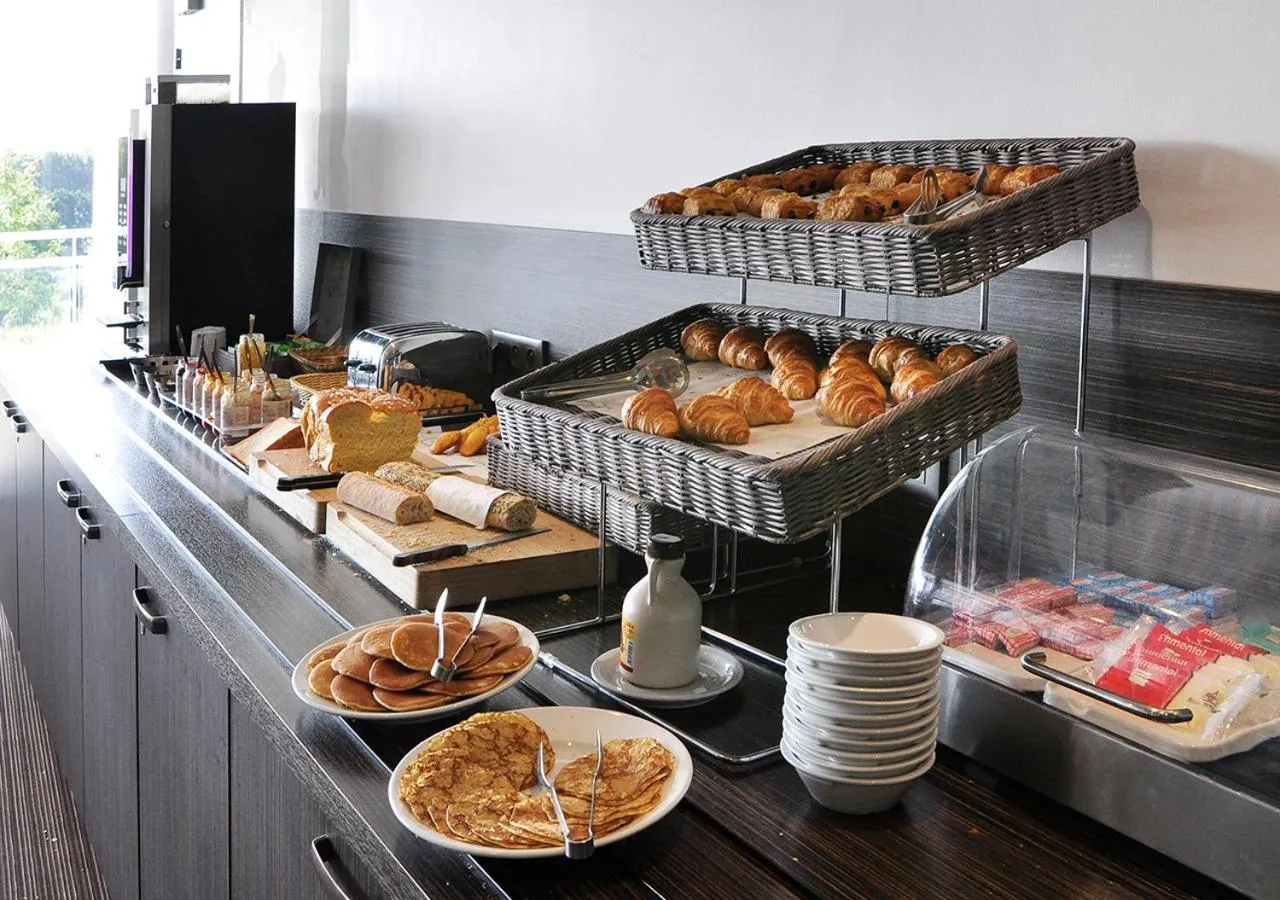 Buffet breakfast in Golden Tulip Pornic Suites- Appart Hotel