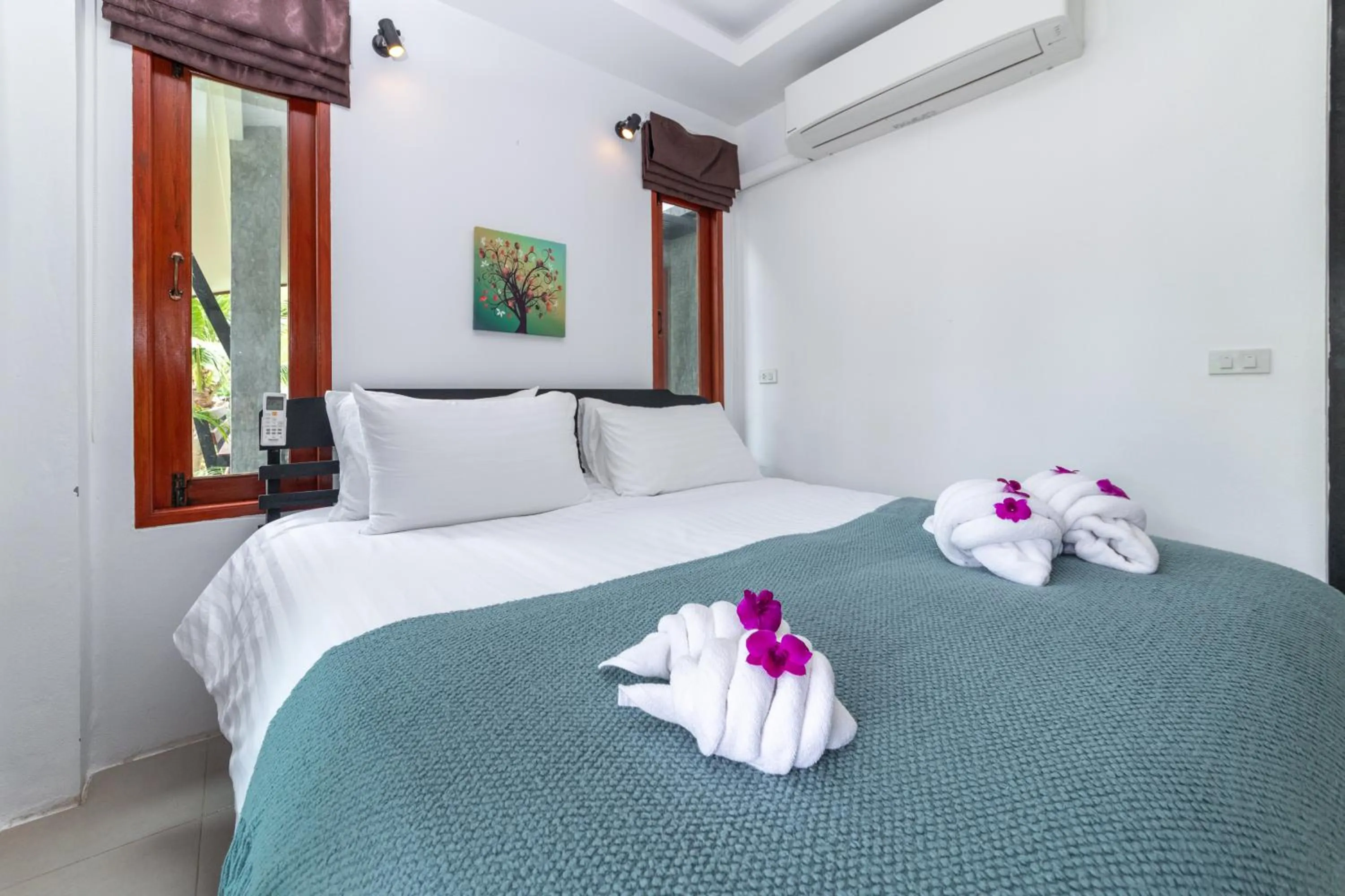 Bed in Ibiza Bungalows