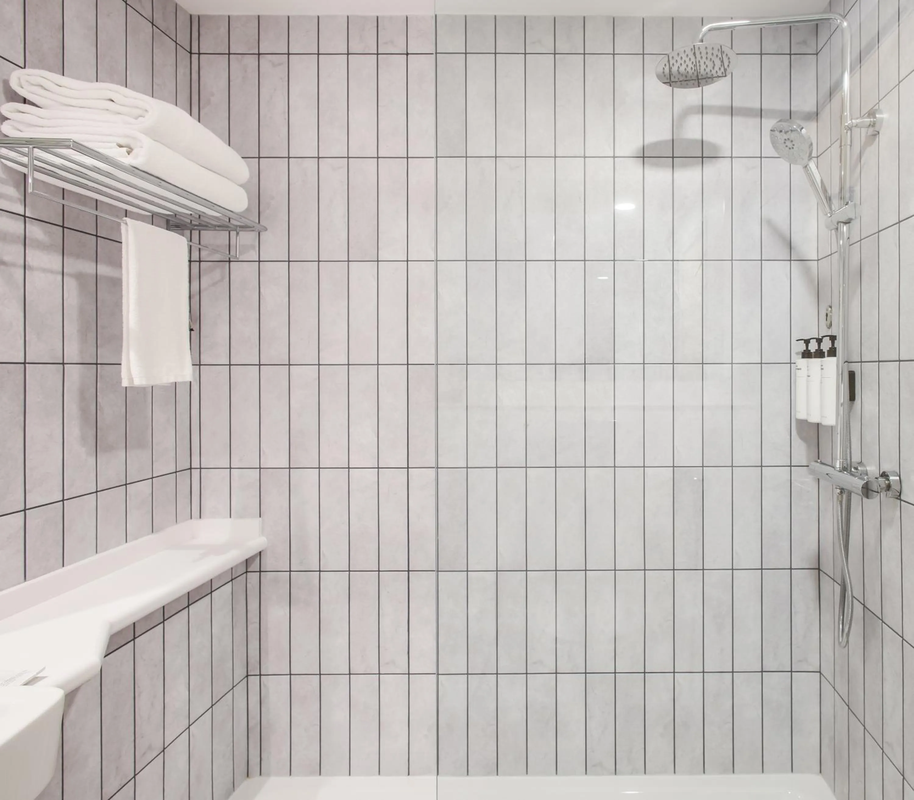 Shower in Premier Inn Dubai International Airport - An Emirates Group Company