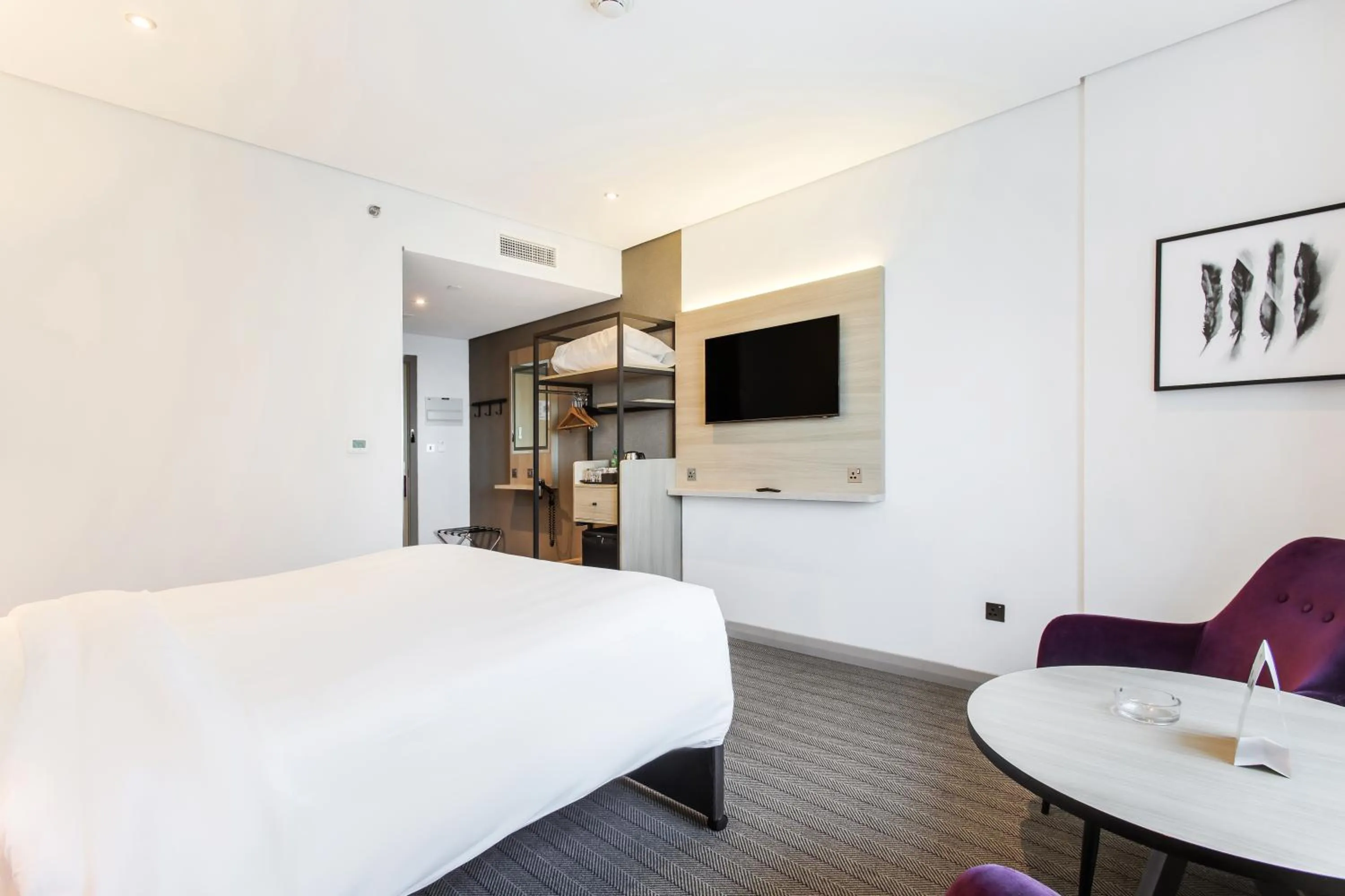 Bed in Premier Inn Dubai International Airport - An Emirates Group Company