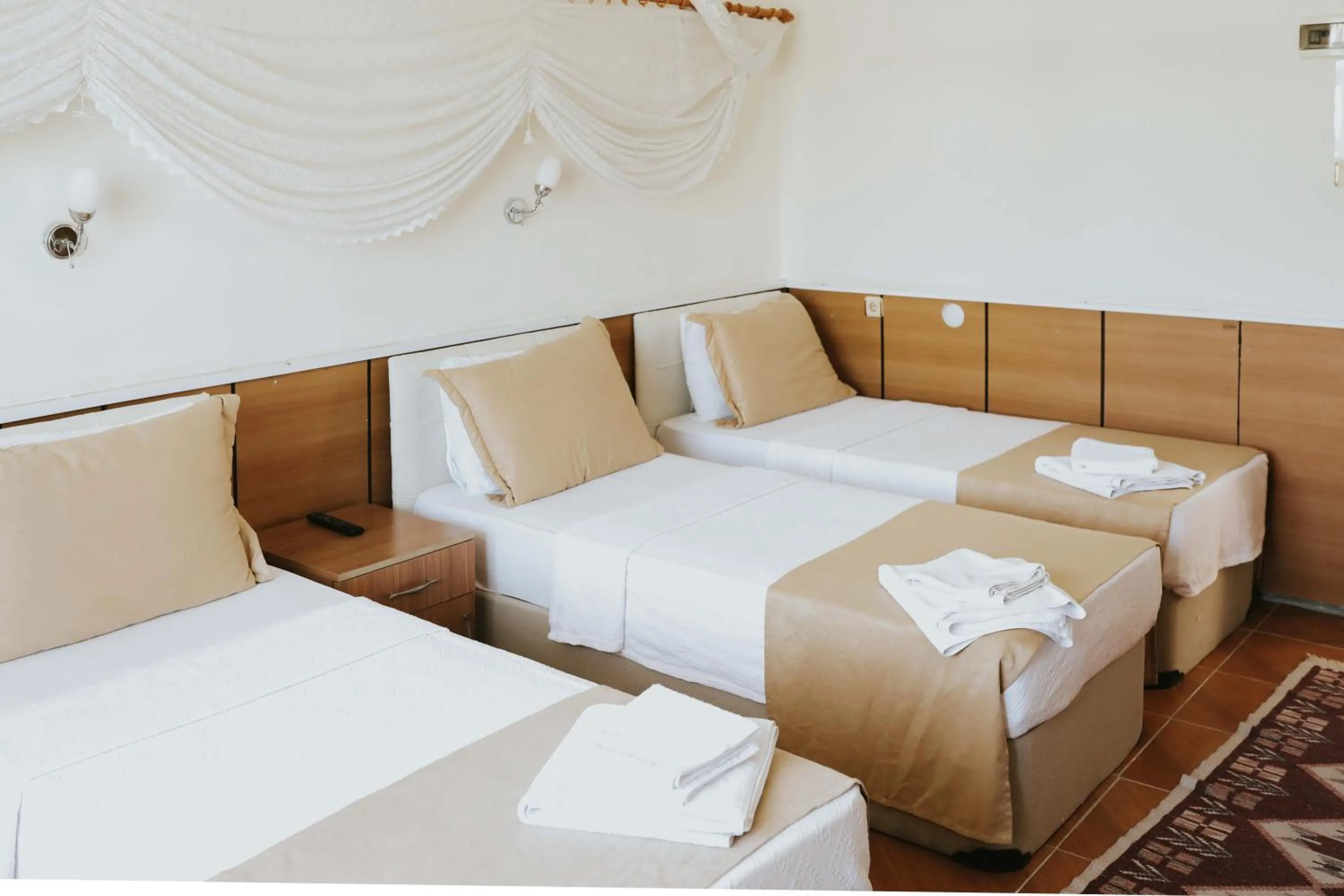 Bed in Kervansaray Hotel