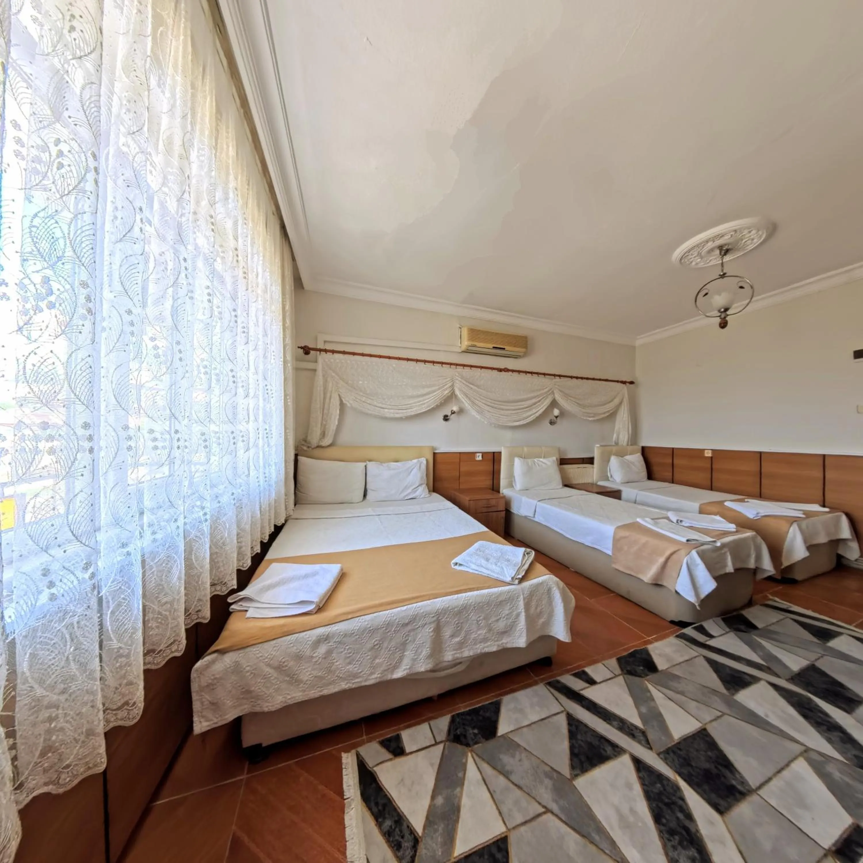 Bed in Kervansaray Hotel