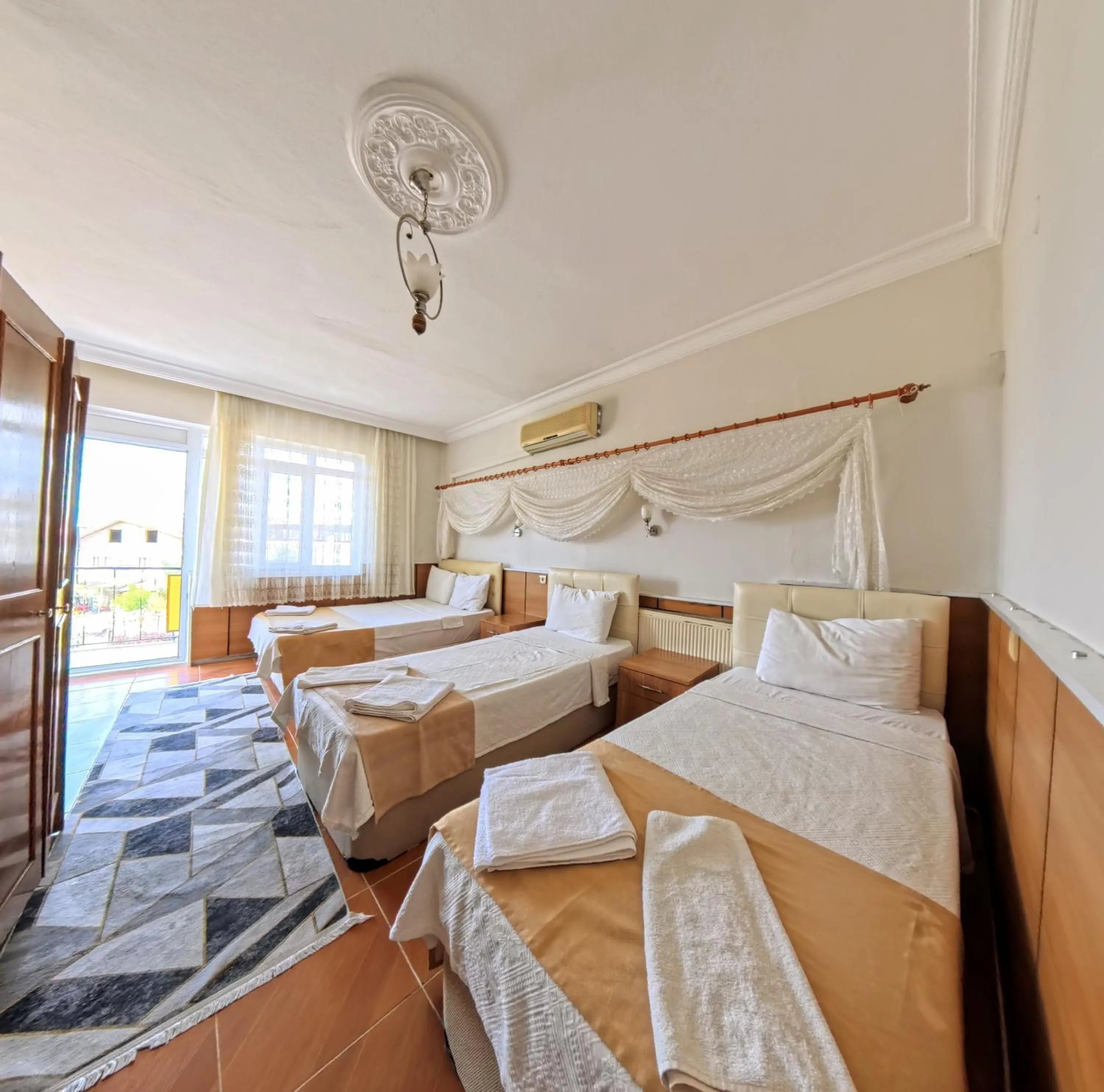 Bed in Kervansaray Hotel