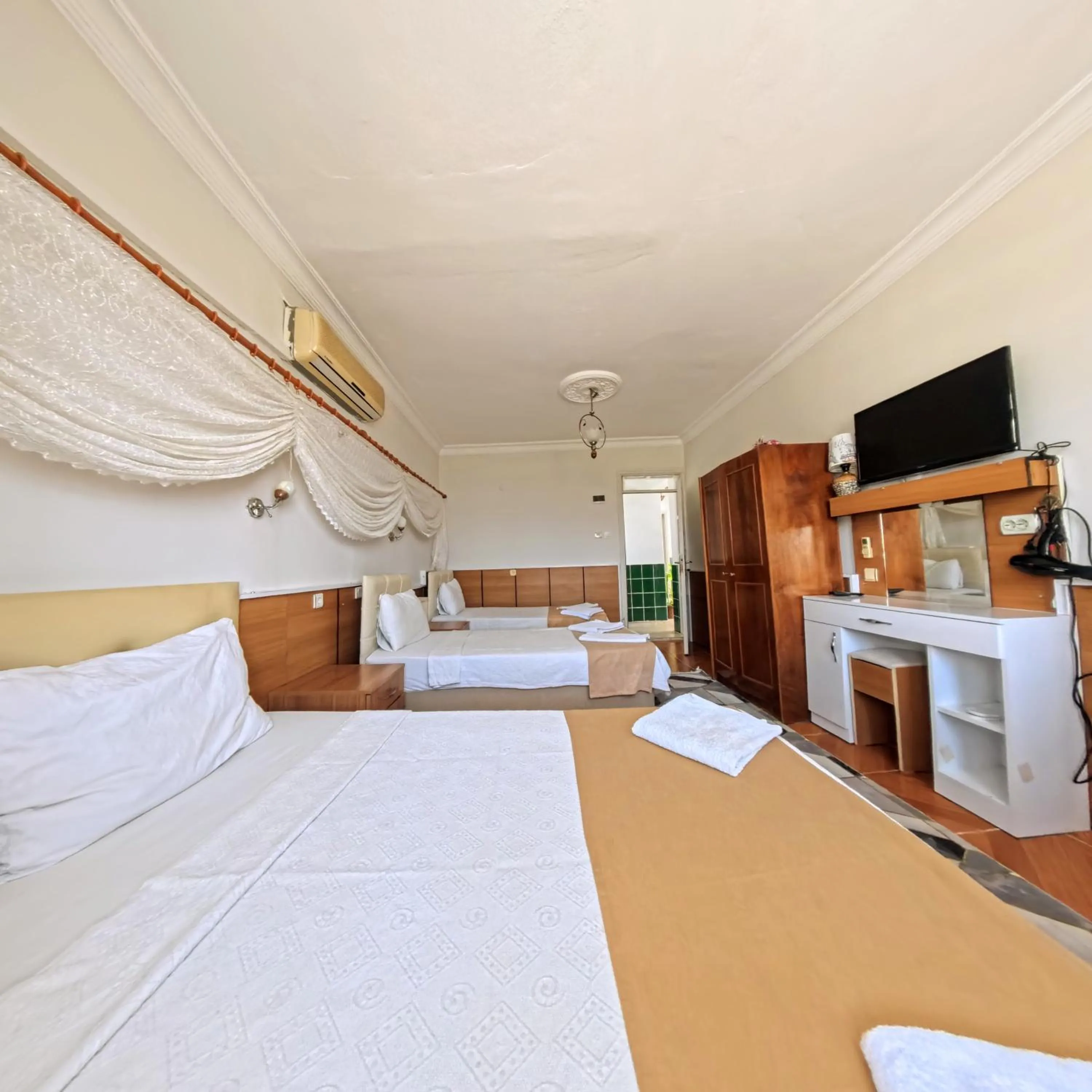 Bed in Kervansaray Hotel