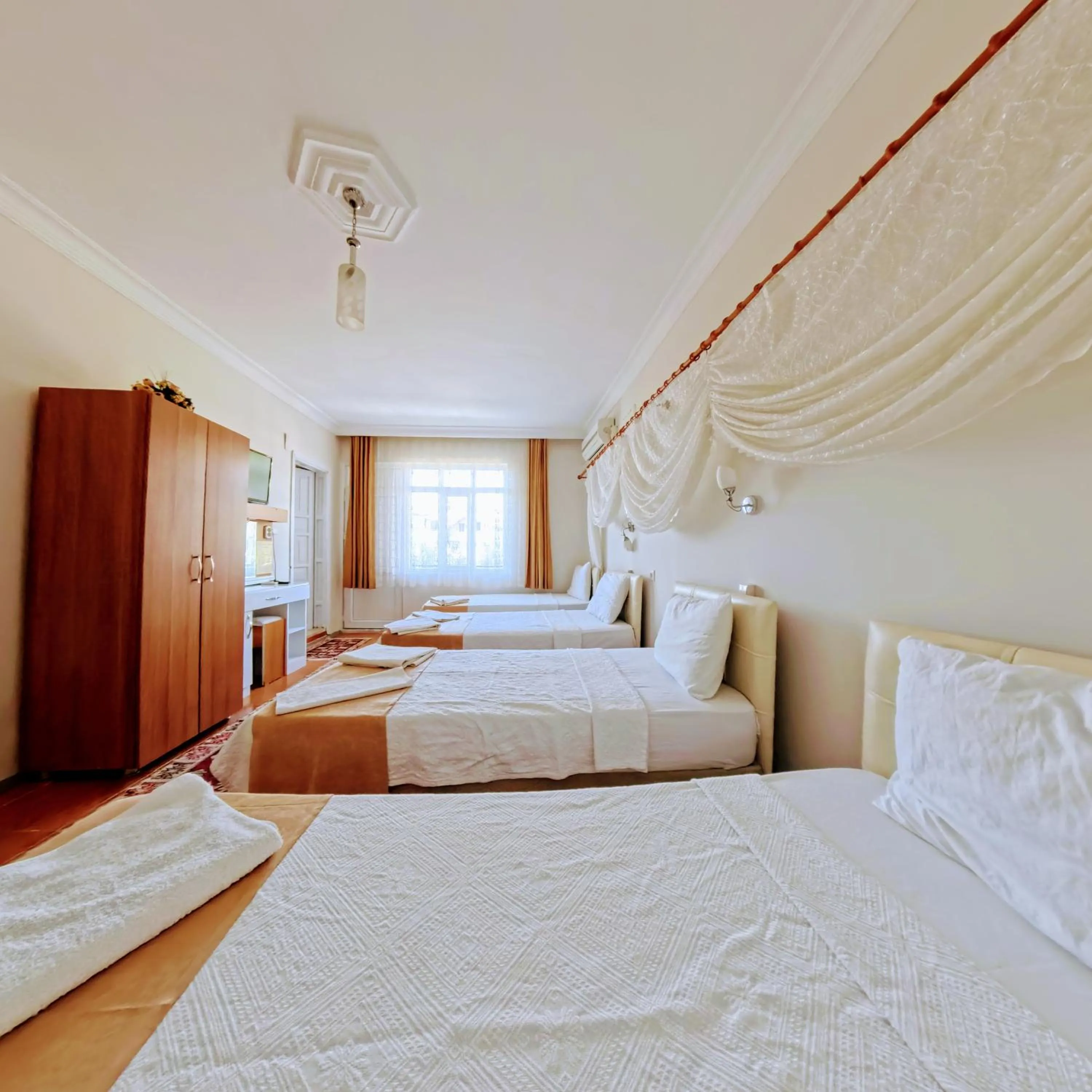 Bed in Kervansaray Hotel
