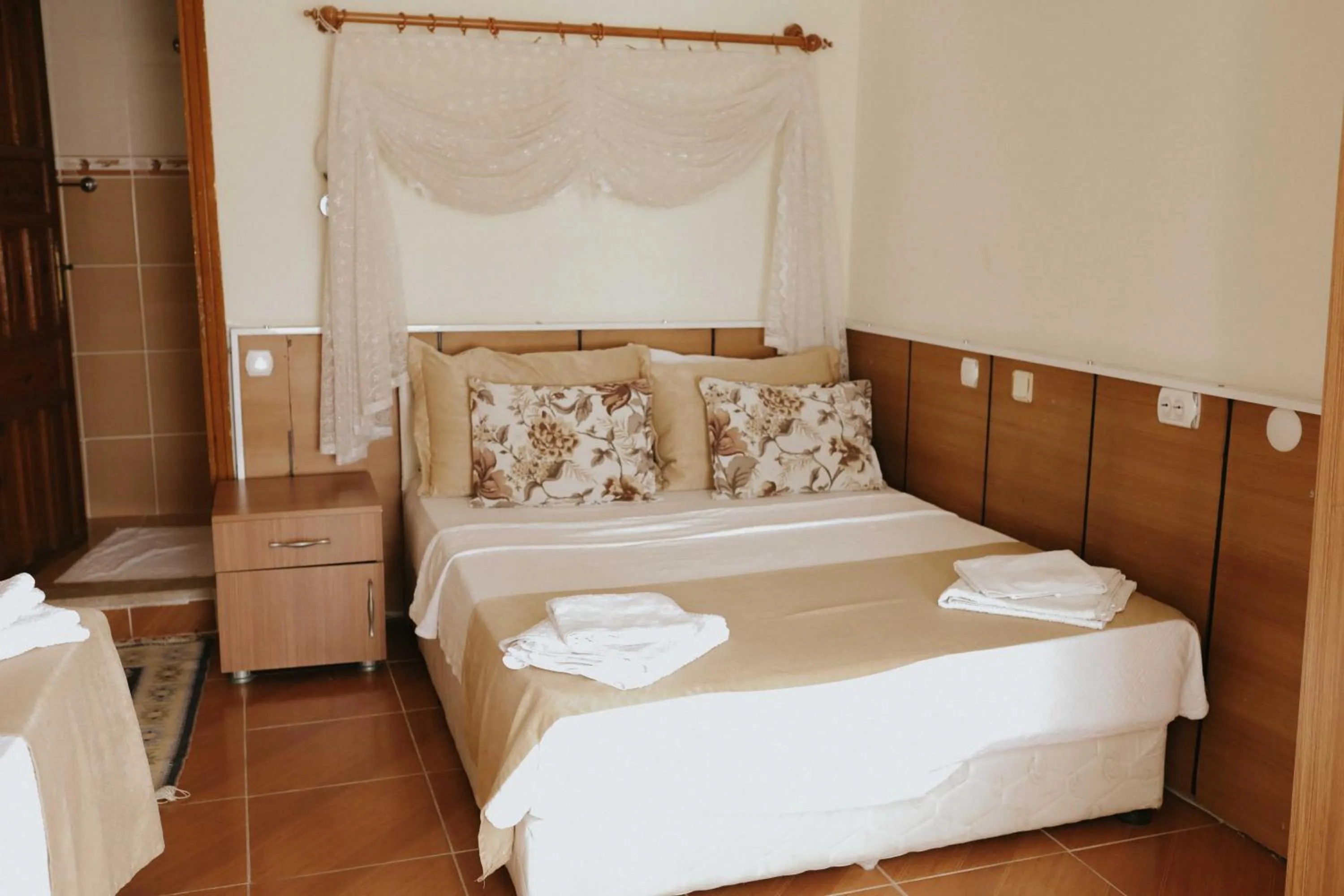 Bed in Kervansaray Hotel