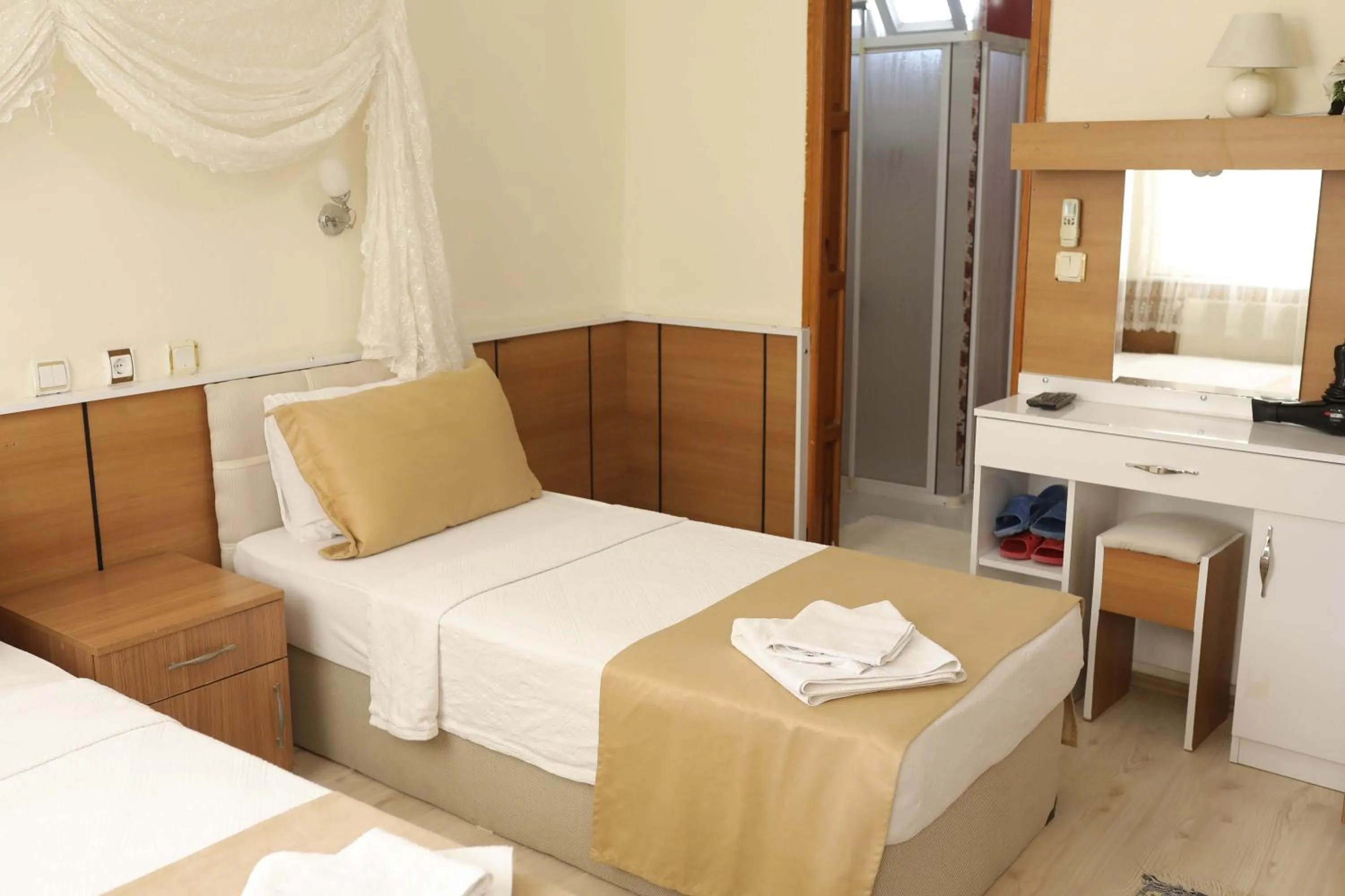 Bed in Kervansaray Hotel