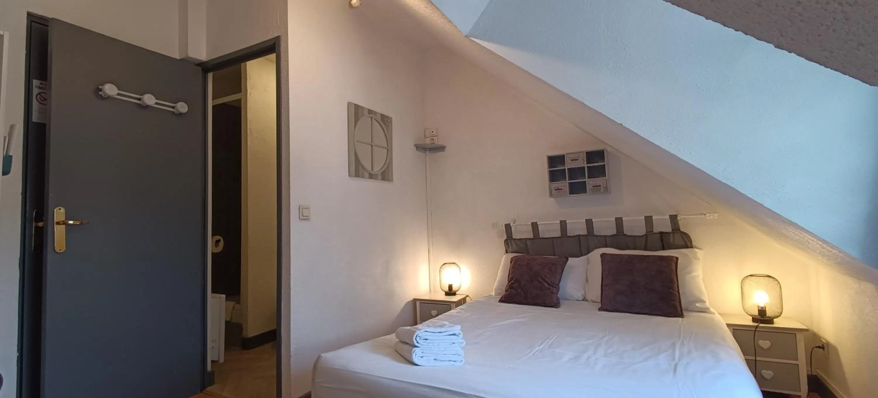 Bed in Hôtel Le P'tit Monde