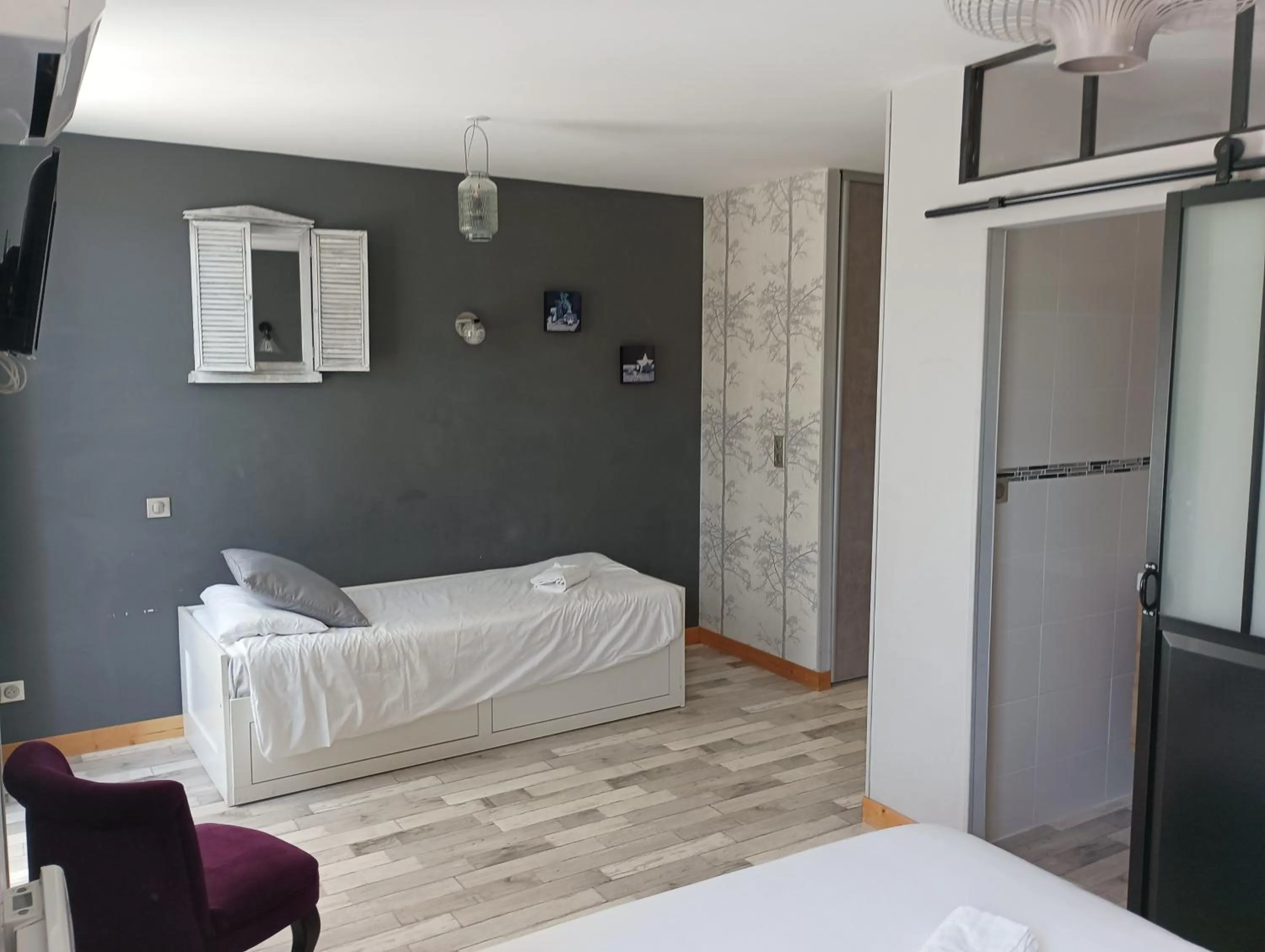 Bed in Hôtel Le P'tit Monde