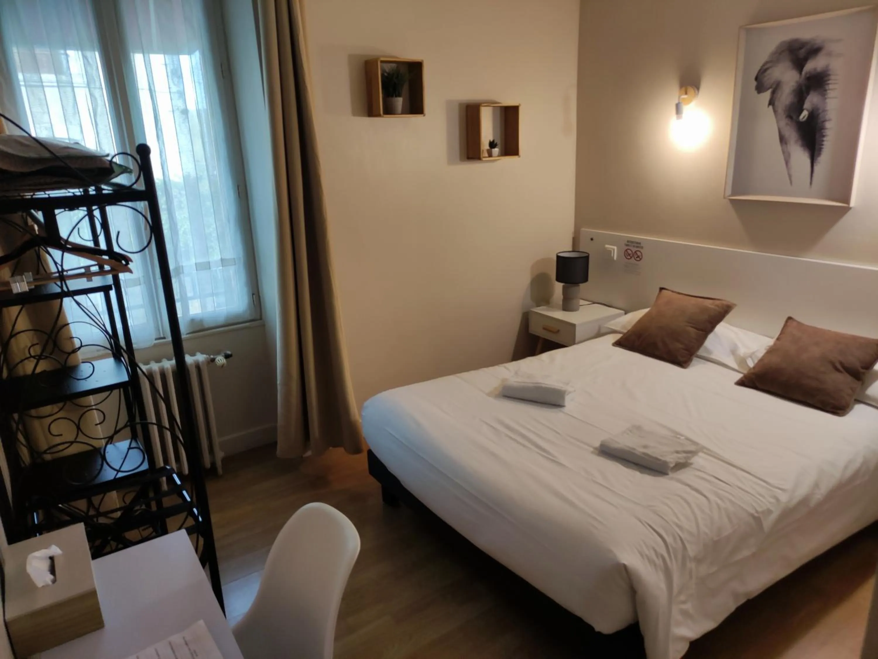 Bed in Hôtel Le P'tit Monde