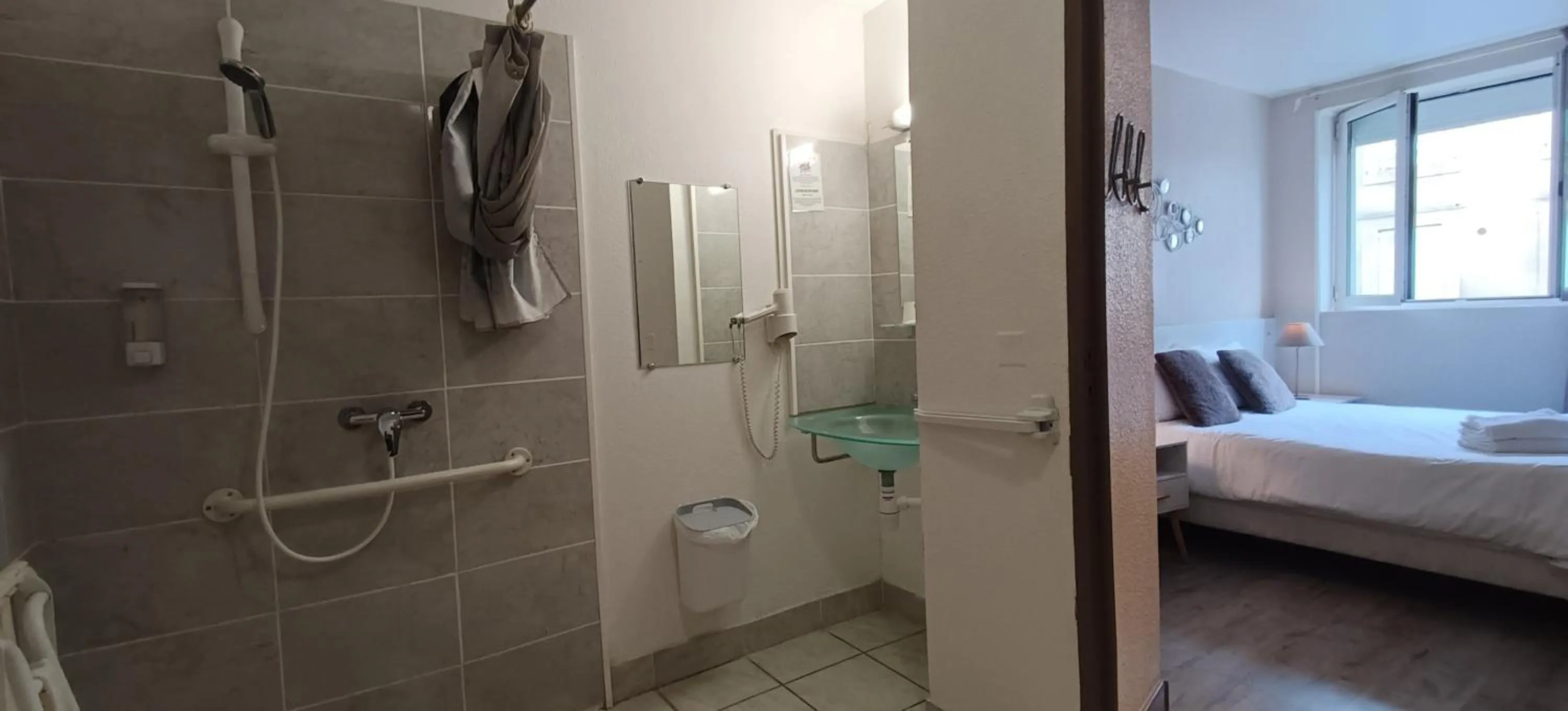 Bed in Hôtel Le P'tit Monde