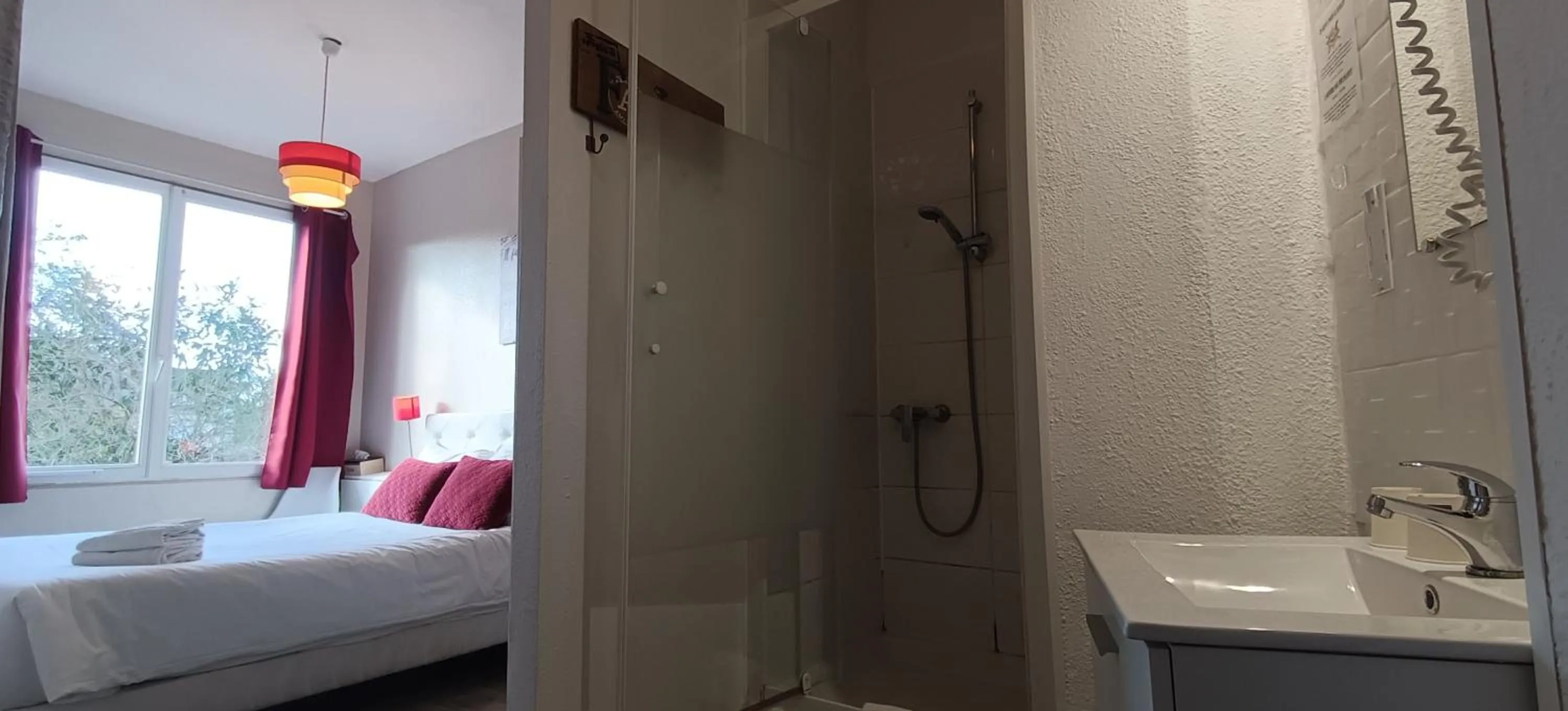 Bed in Hôtel Le P'tit Monde