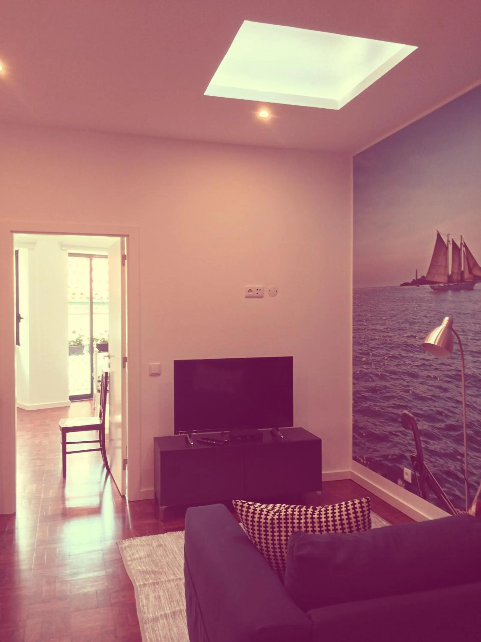 Communal lounge/ TV room in Casa dos Pátios II