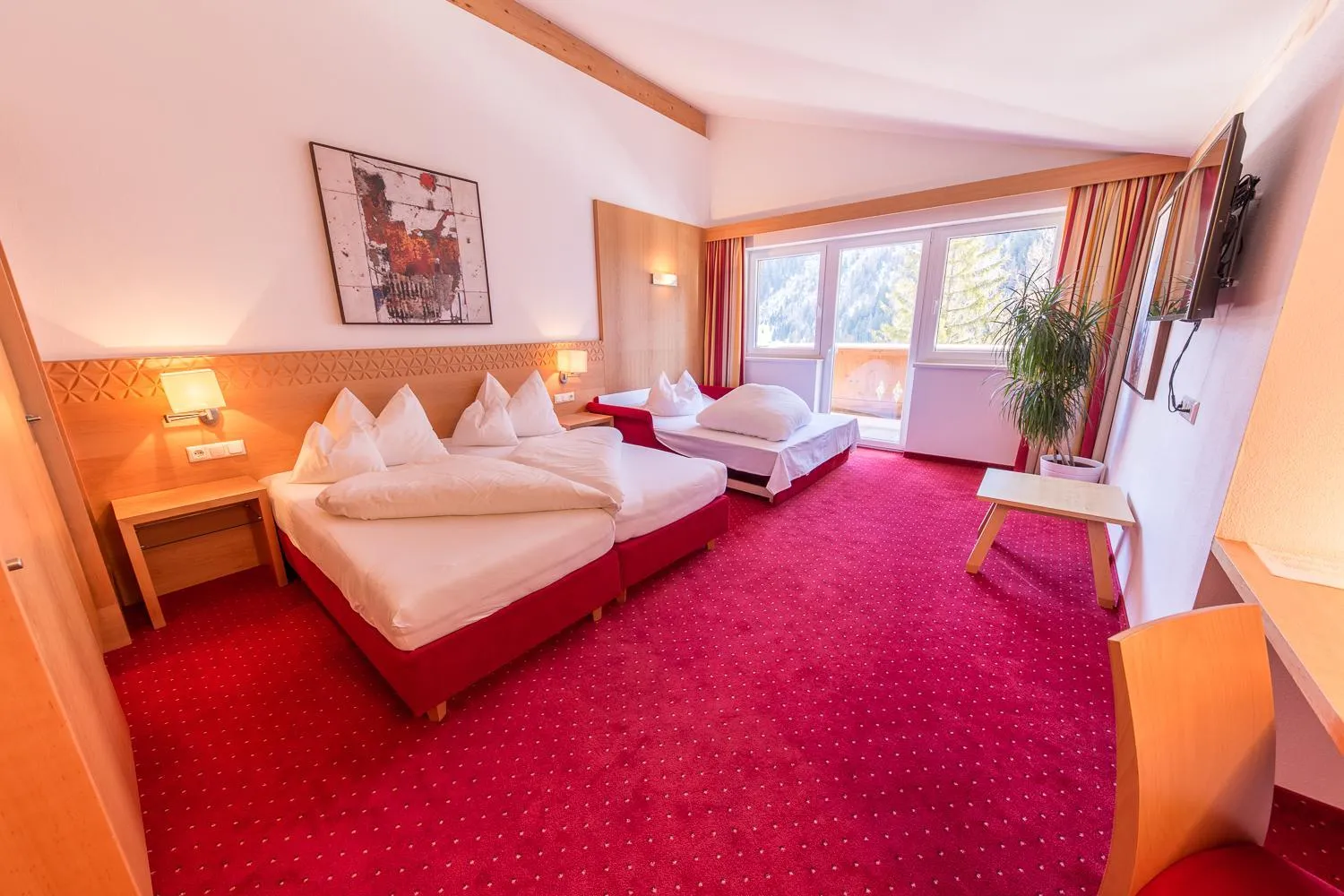 Bed in Hotel Karl Schranz