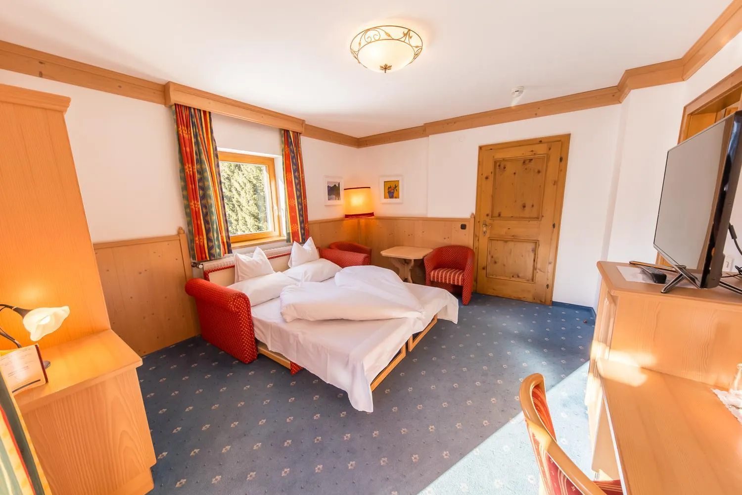 Bed in Hotel Karl Schranz