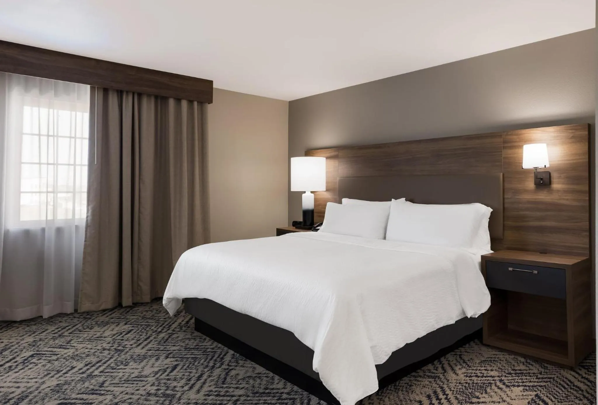 Photo of the whole room, Bed in Candlewood Suites Lafayette - River Ranch by IHG