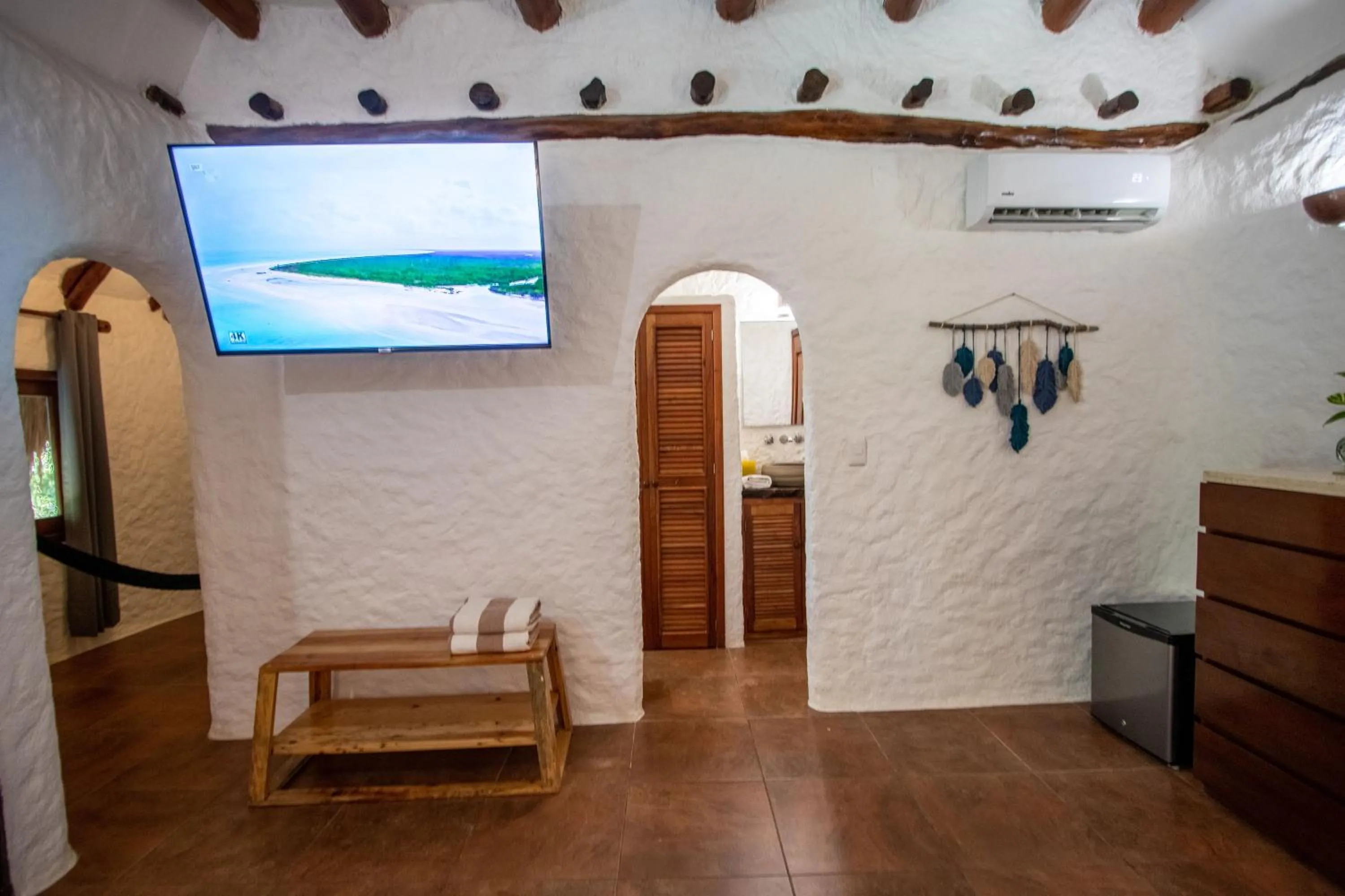 Communal lounge/ TV room in Hotel Las Nubes Holbox